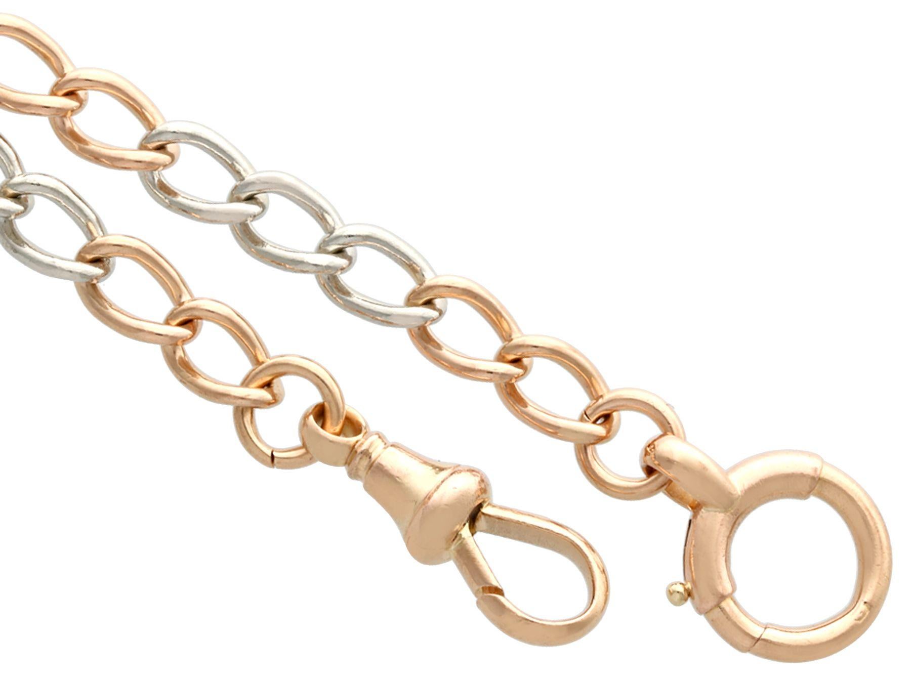 A fine and impressive antique 18 karat yellow gold and platinum double Albert watch chain; part of our diverse antique jewellery and estate jewelry collections.

This fine and impressive antique chain has been crafted in 18k yellow and