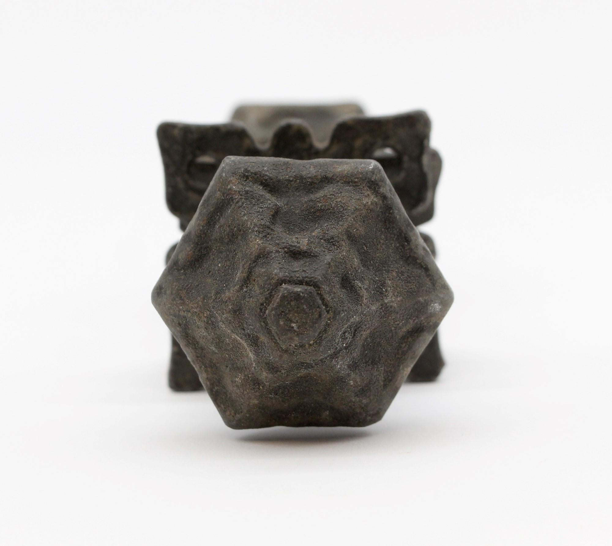 Arts & Crafts cast iron door knob set done in a Medieval style. Each set comes with two cut out rosettes and a keyhole cover as well as two door knobs and spindle. Priced per set. Small quantity available at time of posting. This can be seen at our