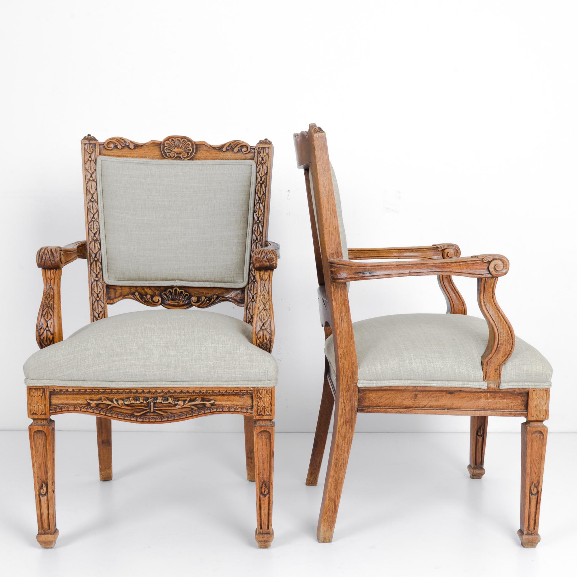 Early 20th Century 1910s Belgian Oak Carved Upholstered Armchairs, a Pair