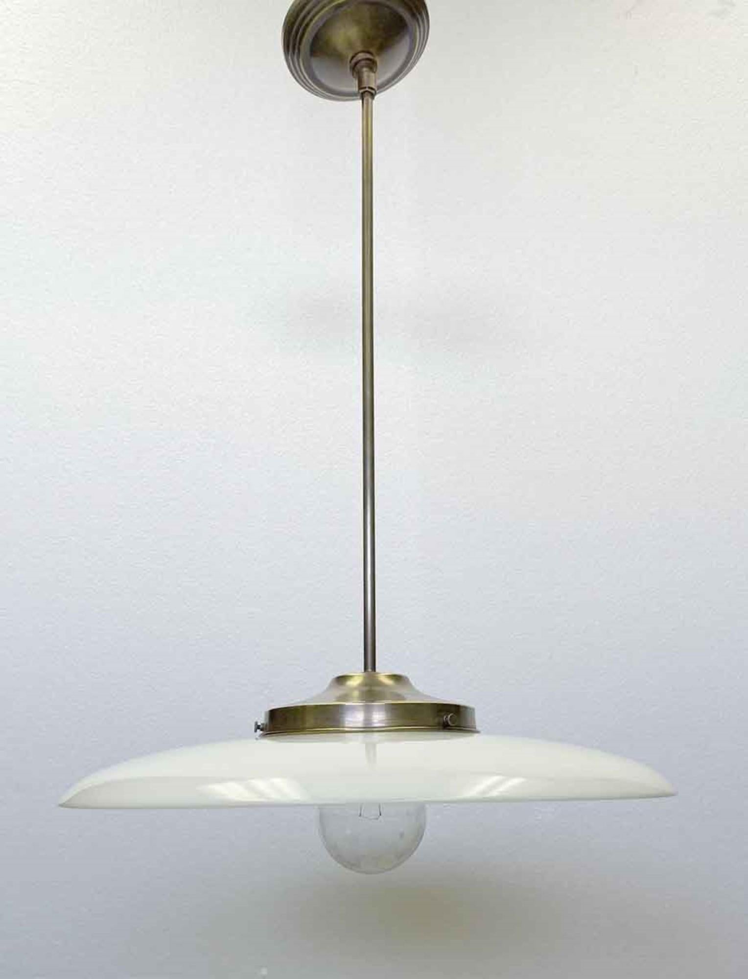 American 1910s Curved Pancake Milk Glass Pendant Light with New Brass Hardware