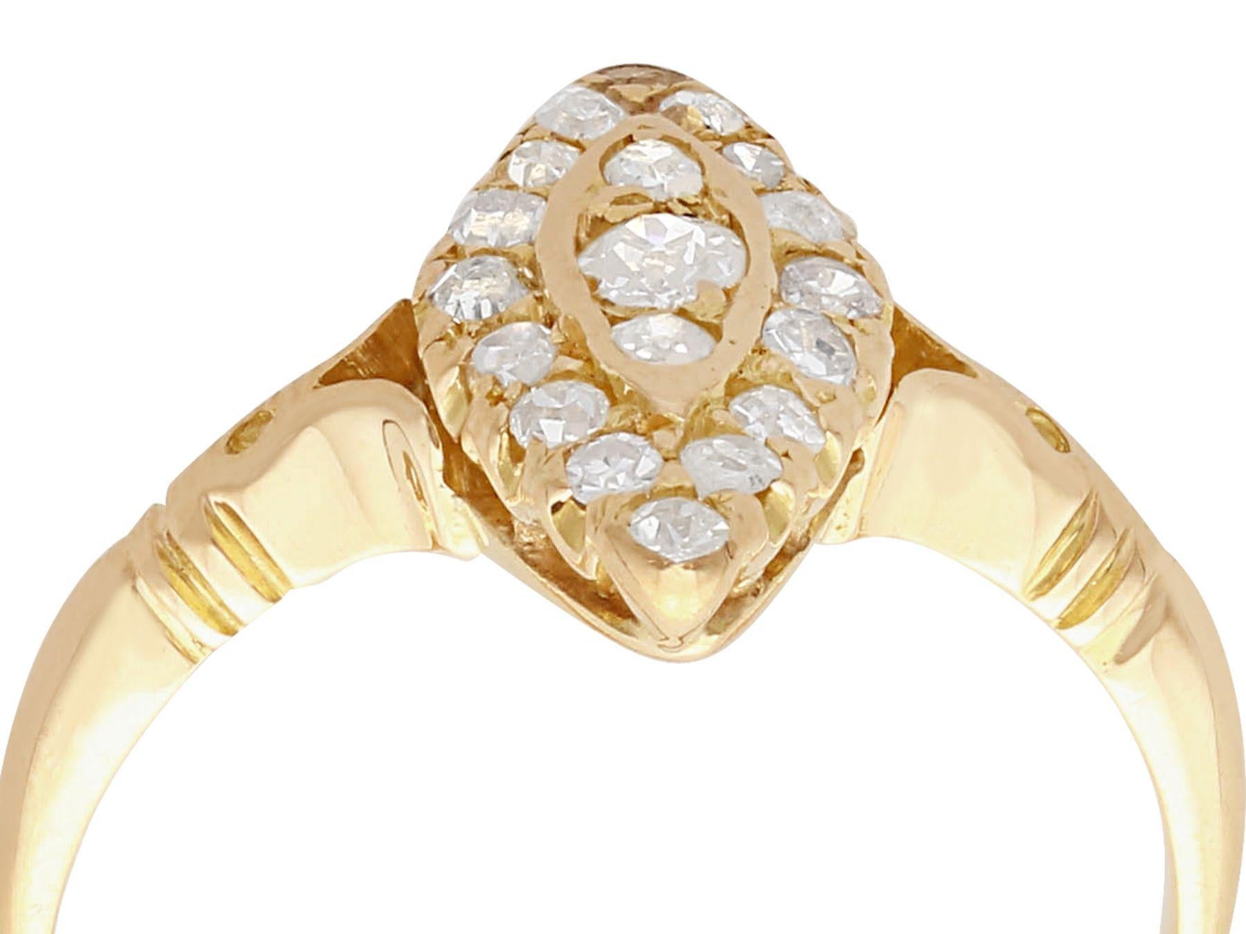 An impressive antique 0.41 carat diamond and 14 karat yellow gold marquise shaped cocktail ring; part of our diverse antique jewelry and estate jewelry collections.

This fine and impressive marquise shaped diamond cluster ring has been crafted in