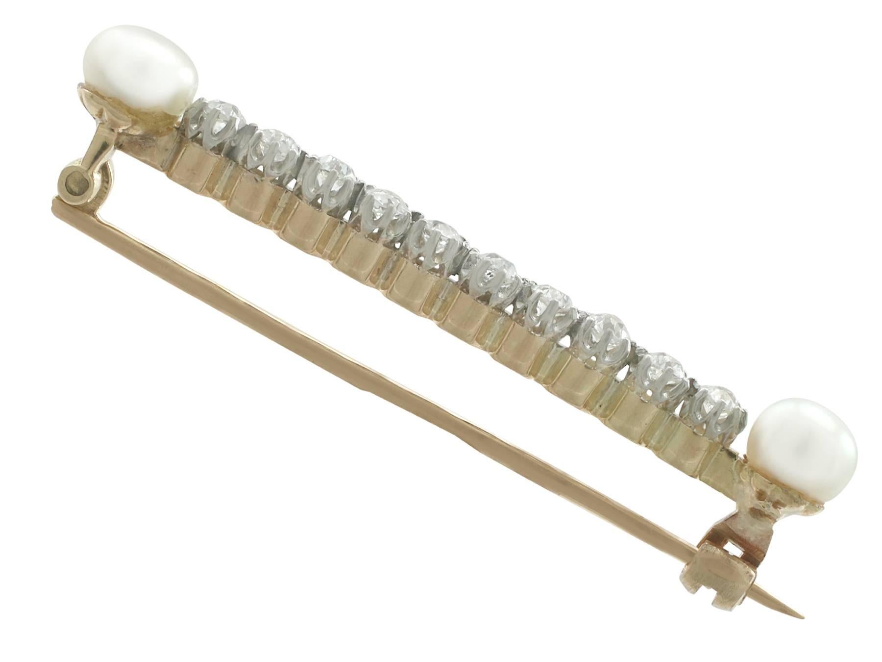 An impressive antique 0.60 carat diamond and pearl, 15 karat yellow gold and platinum set bar brooch; part of our diverse pearl jewelry collections.

This fine and impressive diamond bar brooch with pearls has been crafted in 15 k yellow gold with a