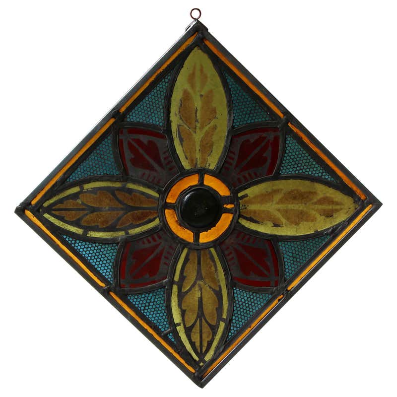 1910s Diamond Shaped Hanging Vibrant Stained Glass With A Center Floral Motif For Sale At
