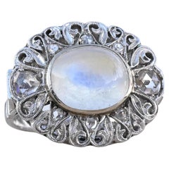 Anello edoardiano del 1910 in filigrana antica con pietra di luna da 5 carati e diamanti a raggiera