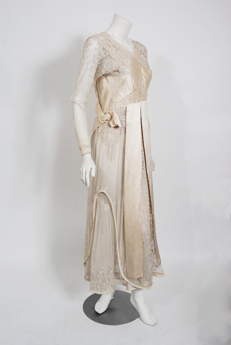 Romantic tea gowns from the early 20th century are perennial favorites and this one is a show-stopper. The garment's effortless style is so modern; the fine embroidery and mixed-laces are a treasure trove of needle art. This beauty, made up of four