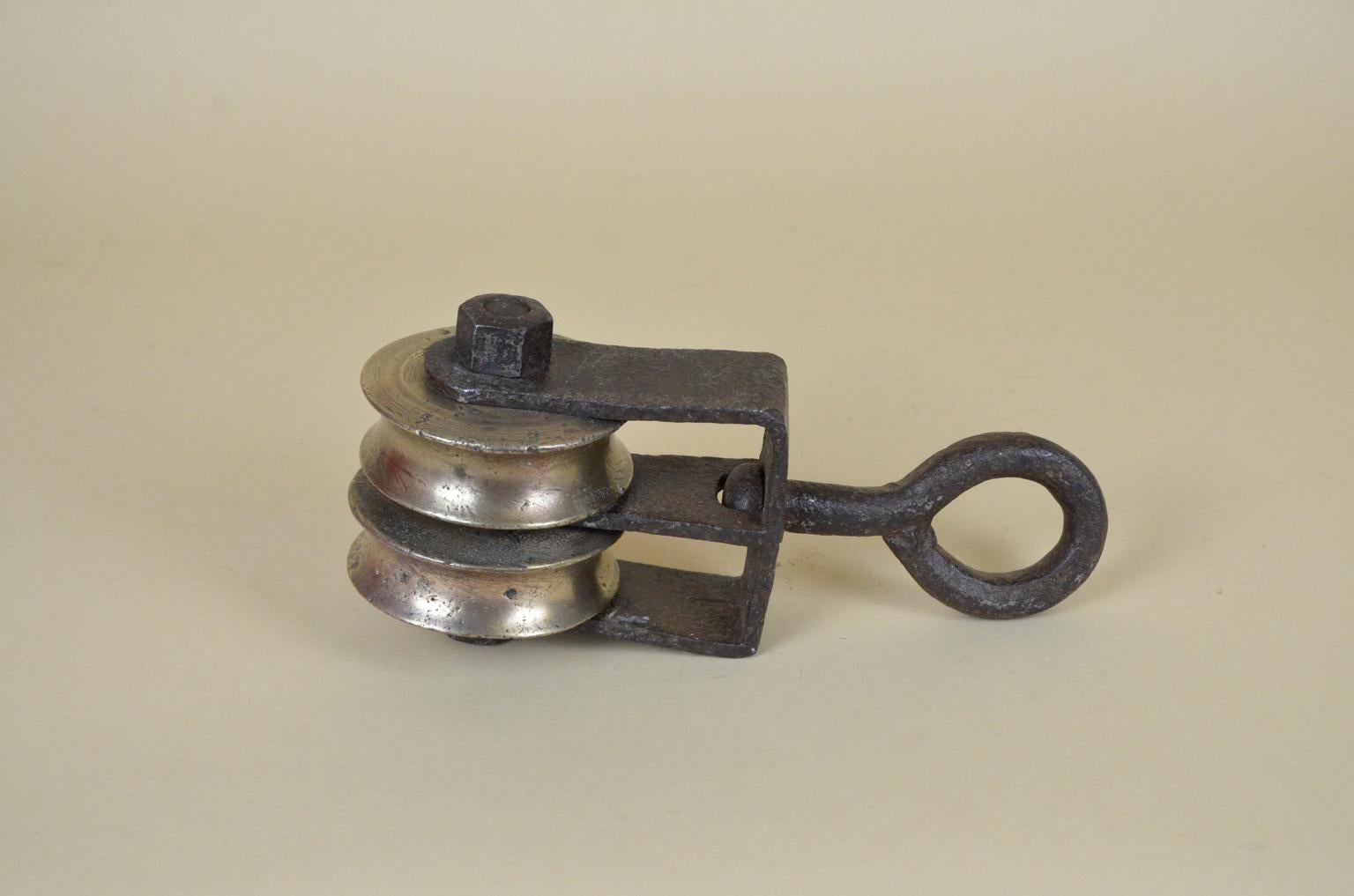 small brass pulleys
