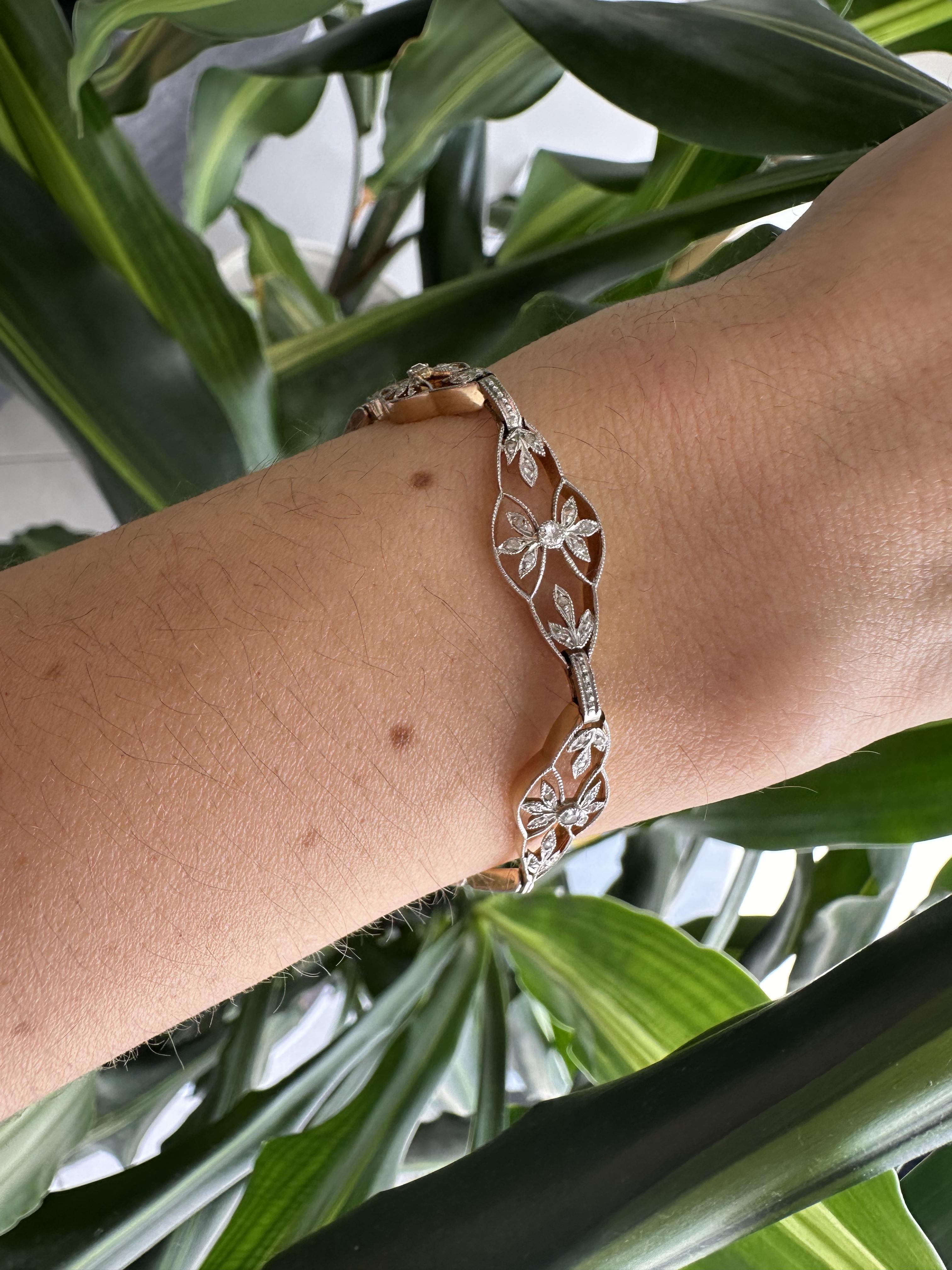 Transport yourself back in time with this captivating antique French bracelet, a true testament to the exquisite craftsmanship and elegance of European jewelry artistry, expertly crafted in lustrous 18kt yellow gold with platinum detailing and
