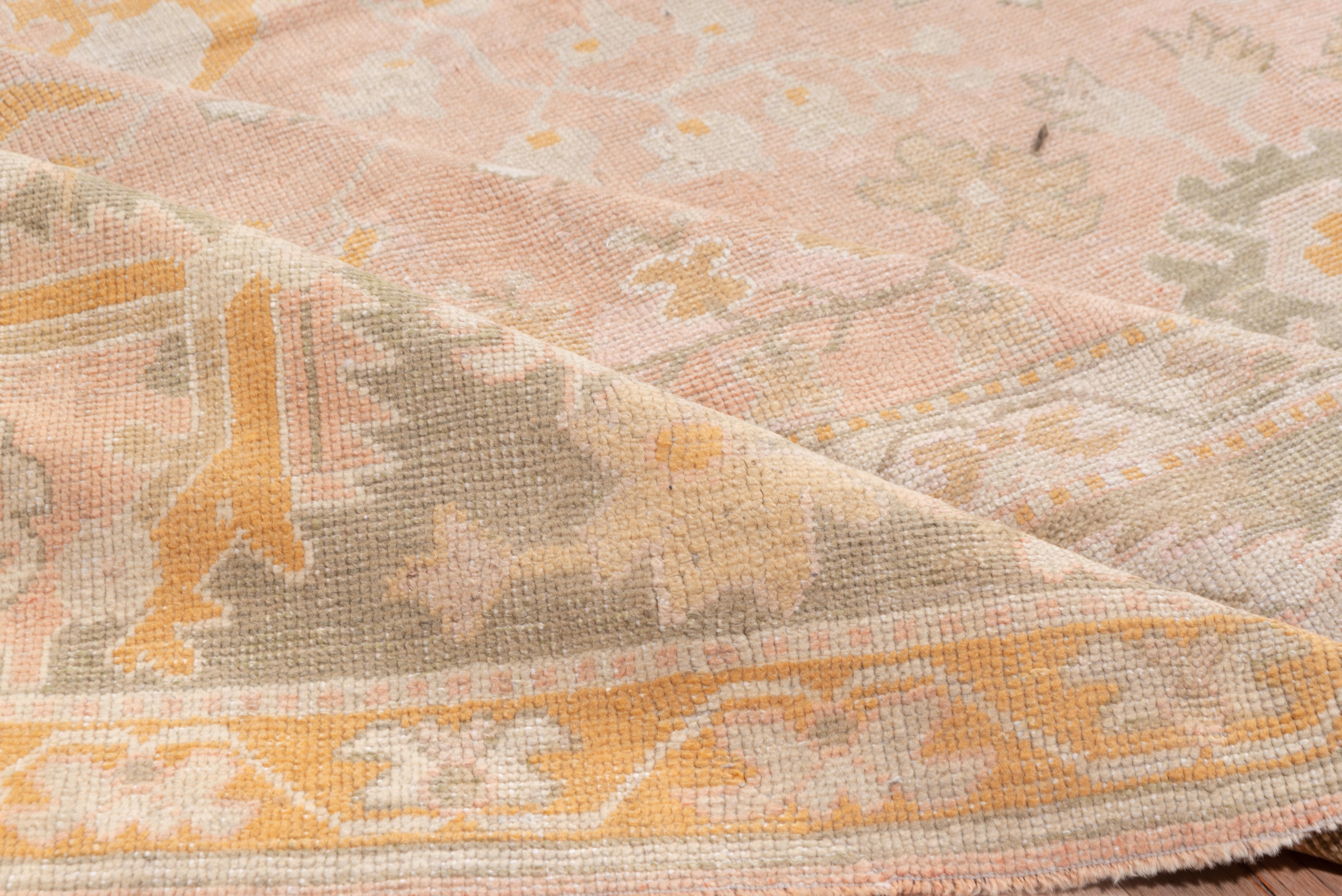 Hand-Knotted 1910s Gorgeous Antique Turkish Oushak Carpet, Pink Field, Green Orange Accents For Sale
