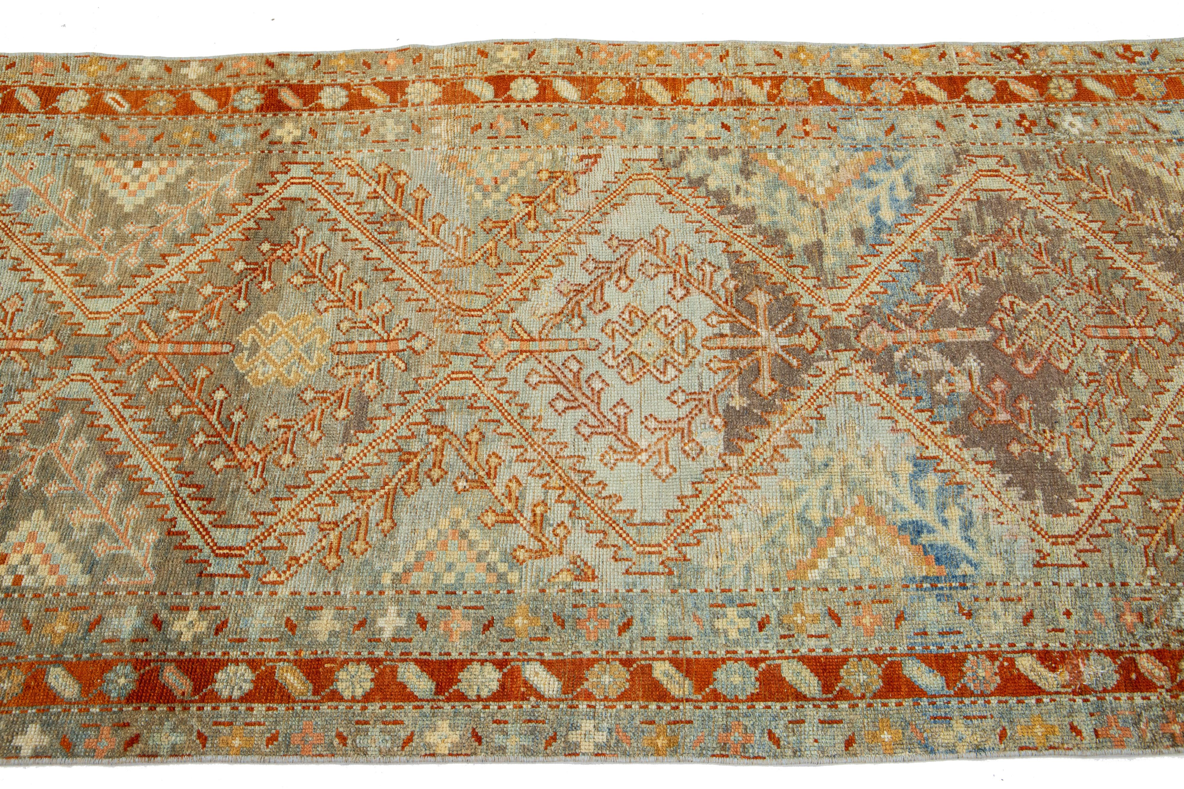 1910s Handmade Antique Malayer Wool Runner with Rust Tribal Motif In Good Condition For Sale In Norwalk, CT