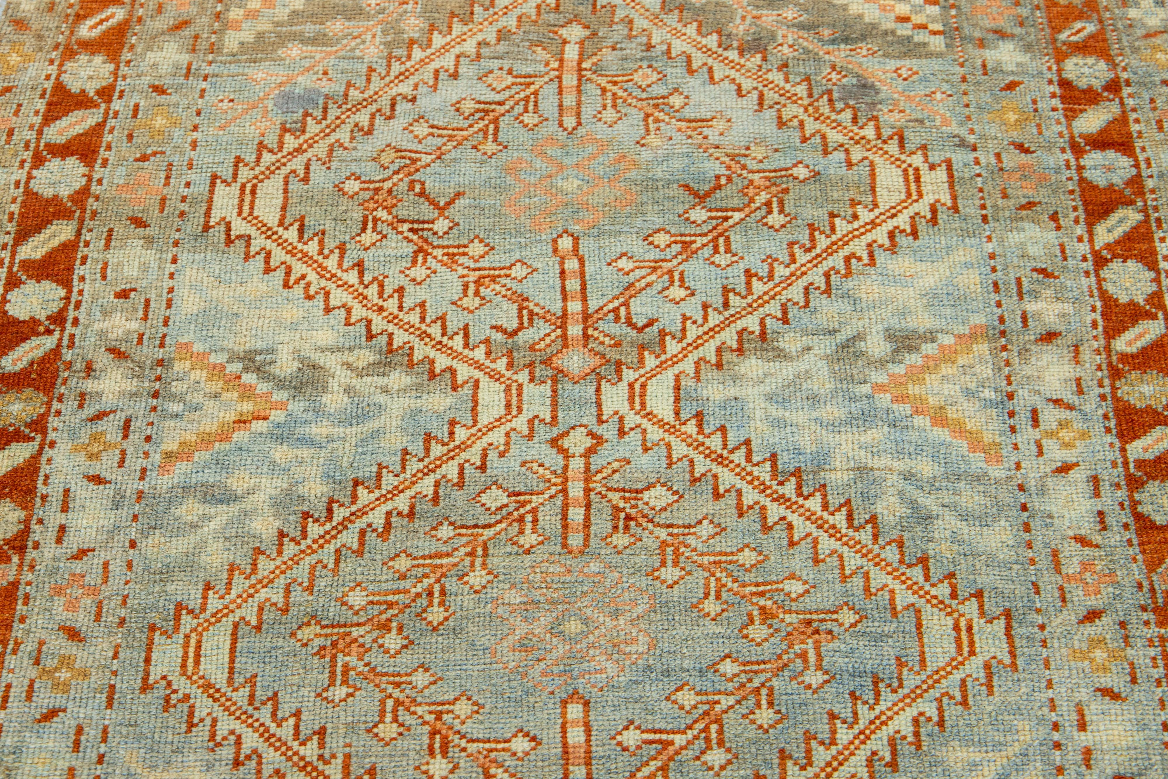 1910s Handmade Antique Malayer Wool Runner with Rust Tribal Motif For Sale 1