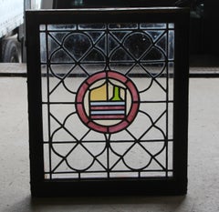 1910s Leaded and Stained Glass Window with Shield Design and Quatrefoil Details