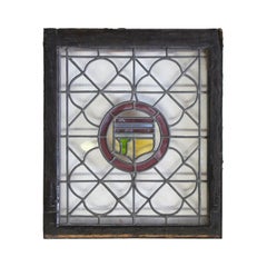 1910s Leaded and Stained Glass Window with Shield Design and Quatrefoil Details