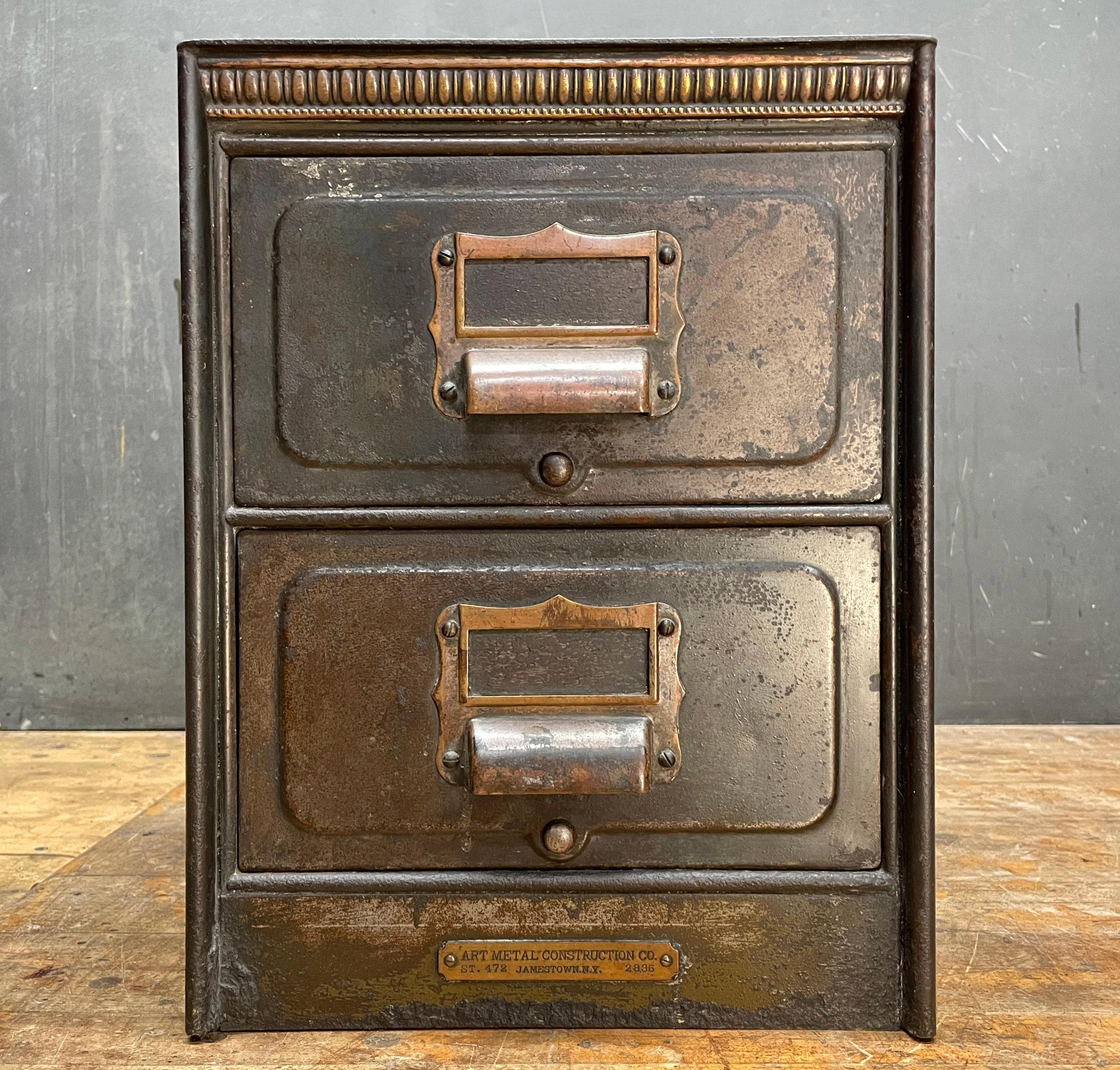 A rare and hard to find small desktop organizer by the Metal Art Construction Company of Jamestown New York. The drawer bottoms have been lined with thin wood panels. There are heavy losses from oxidation on the underside but not visible when item