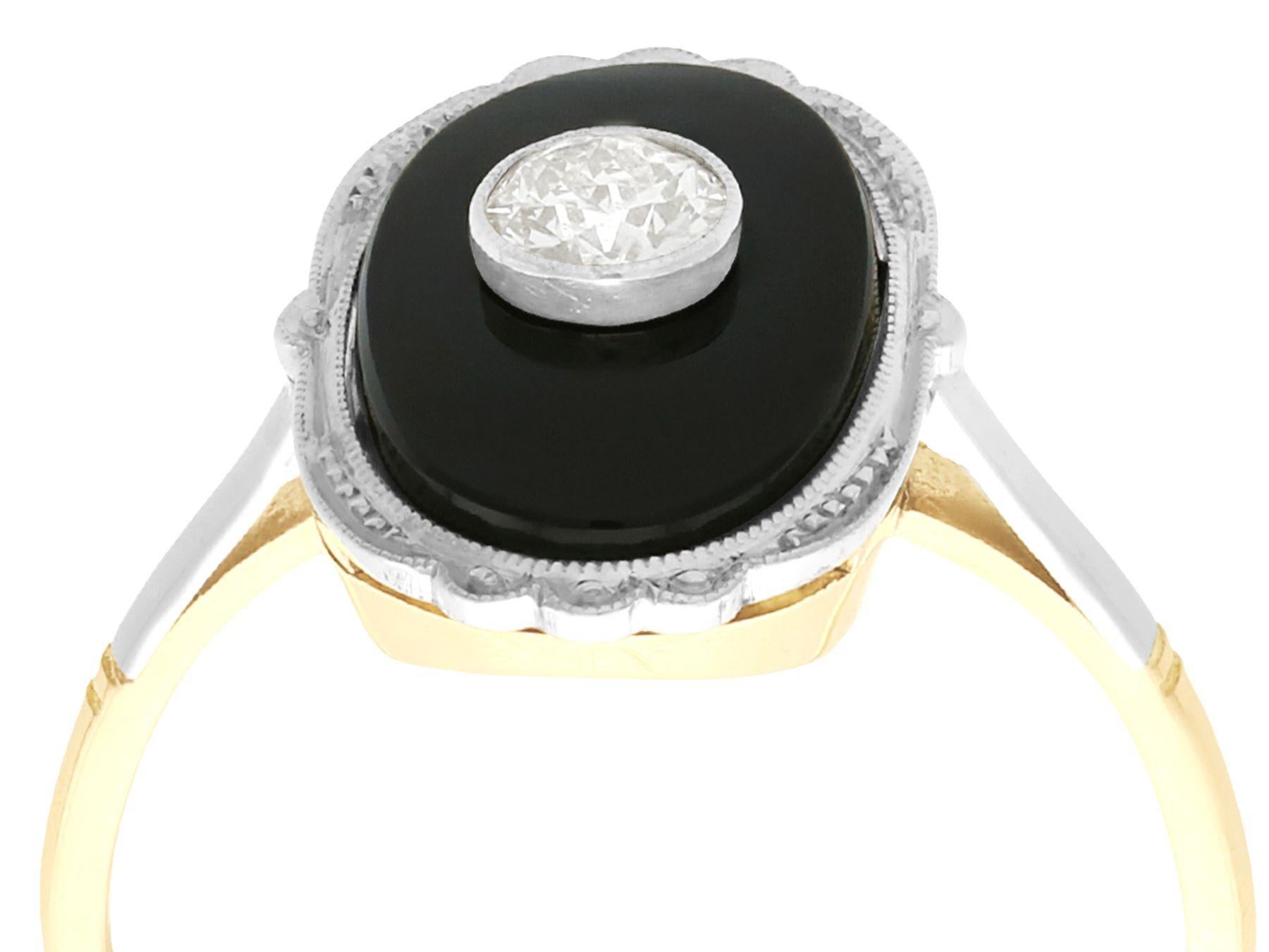 A fine and impressive 0.38 carat diamond and black onyx, 12k yellow gold dress ring with a 12k white gold setting; part of our diverse antique jewelry and estate jewelry collections

This fine and impressive diamond and onyx dress ring has been
