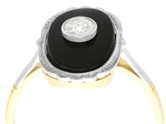 1910s Onyx and Diamond Yellow Gold Cocktail Ring