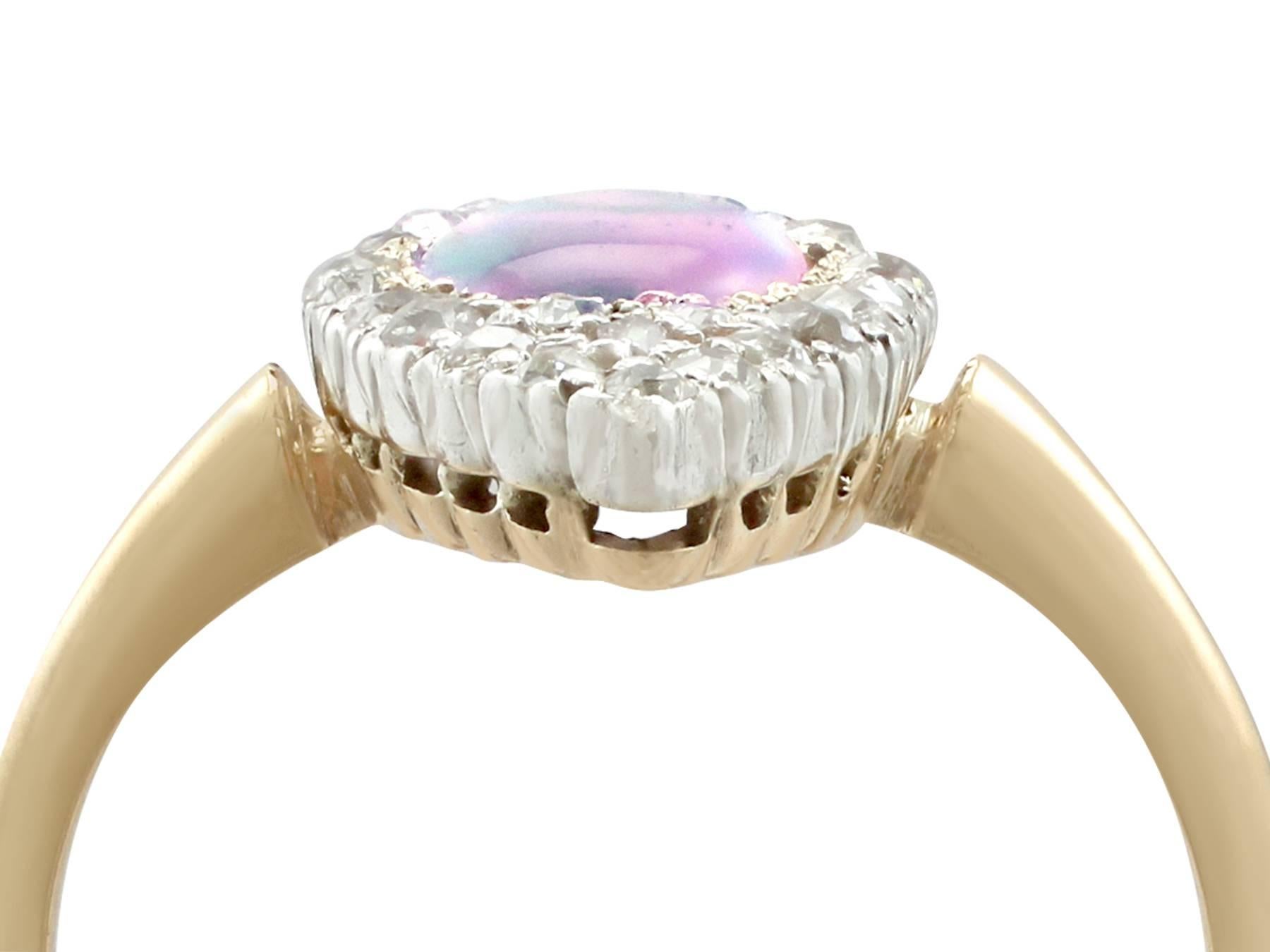 An impressive antique 0.52 carat opal and 0.46 carat diamond, 18 karat yellow gold and 18 karat white gold set dress ring; part of our diverse antique jewellery collections

This fine and impressive marquise opal and diamond ring has been crafted in