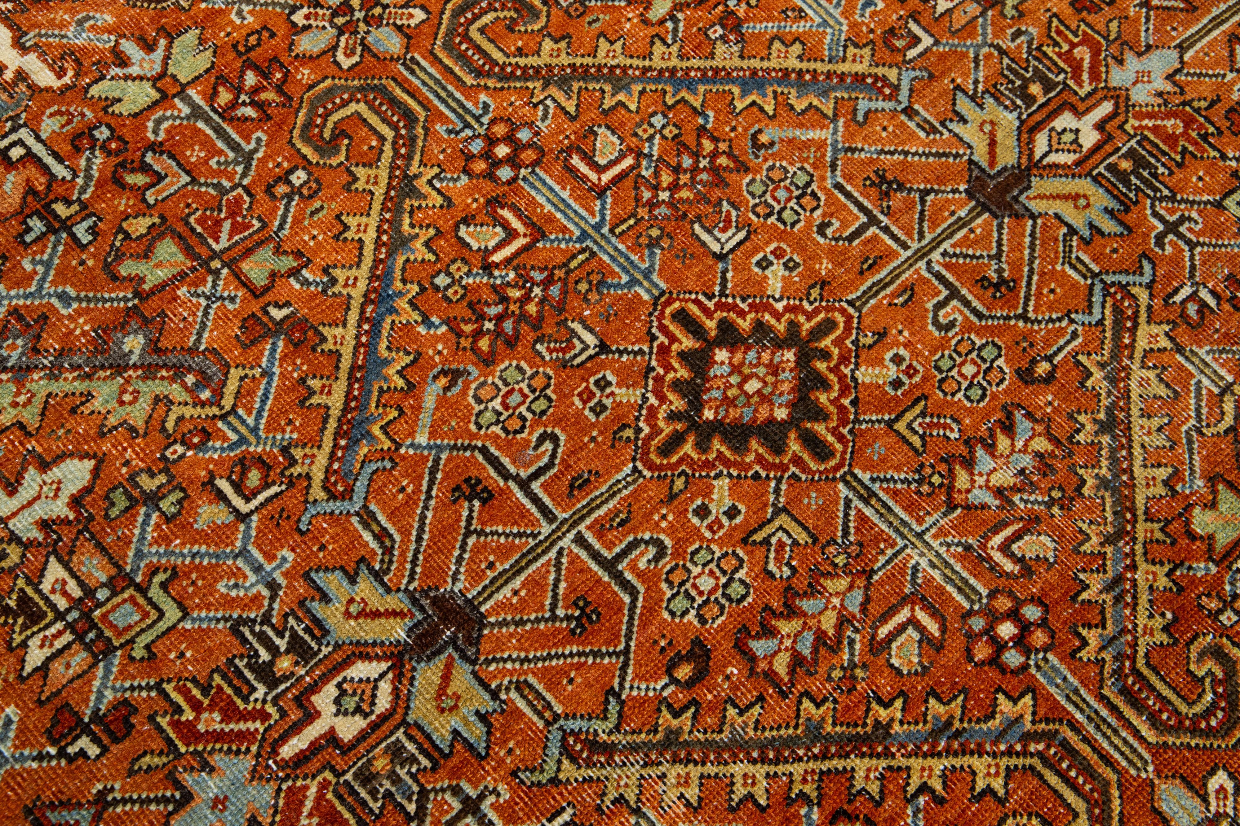 1910s Orange-Rust Antique Persian Heriz Wool Rug Handmade with Allover Pattern For Sale 1