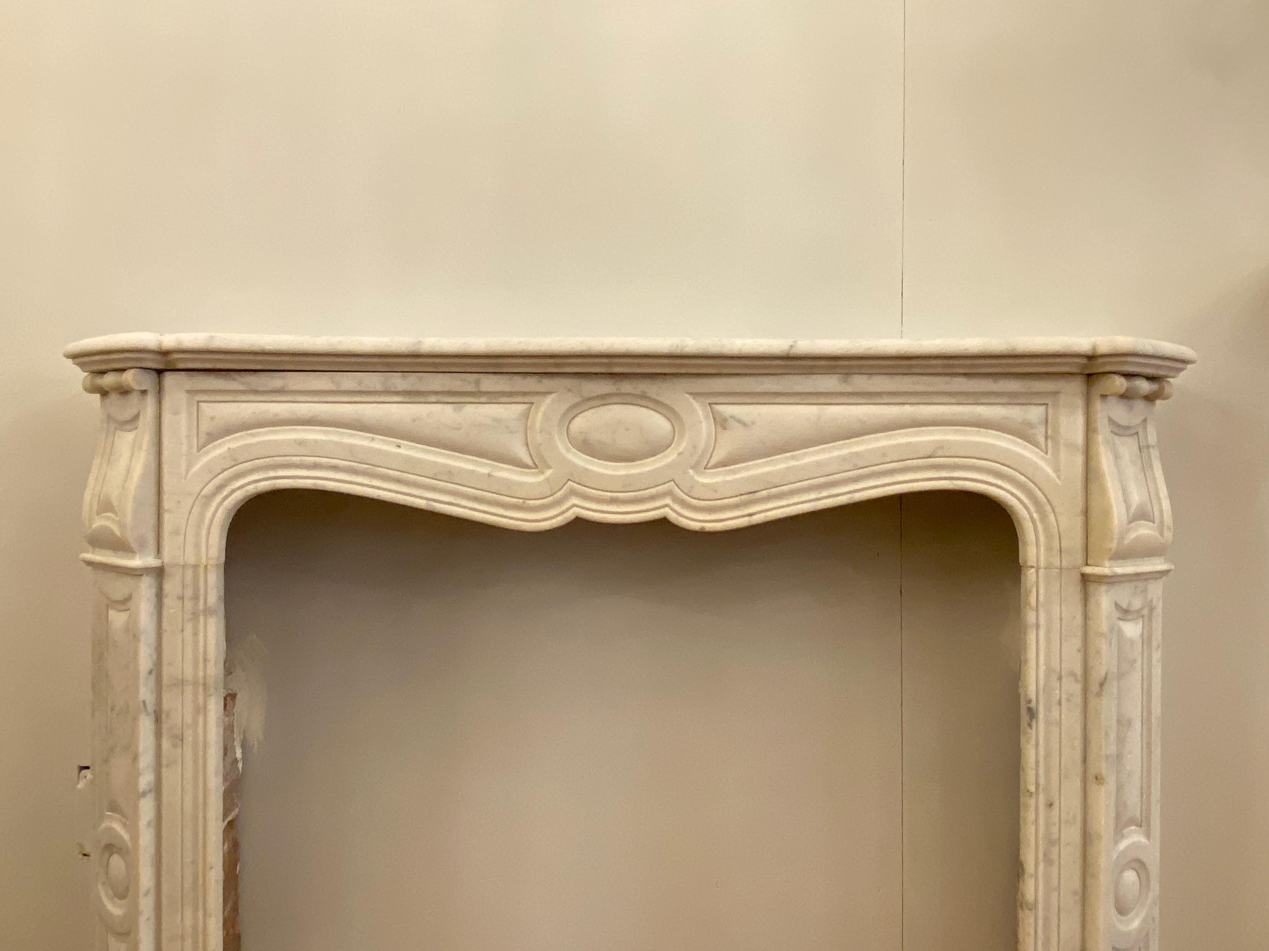 1910s Petite French White Carrara Marble Mantel from West 9th St in Manhattan 2