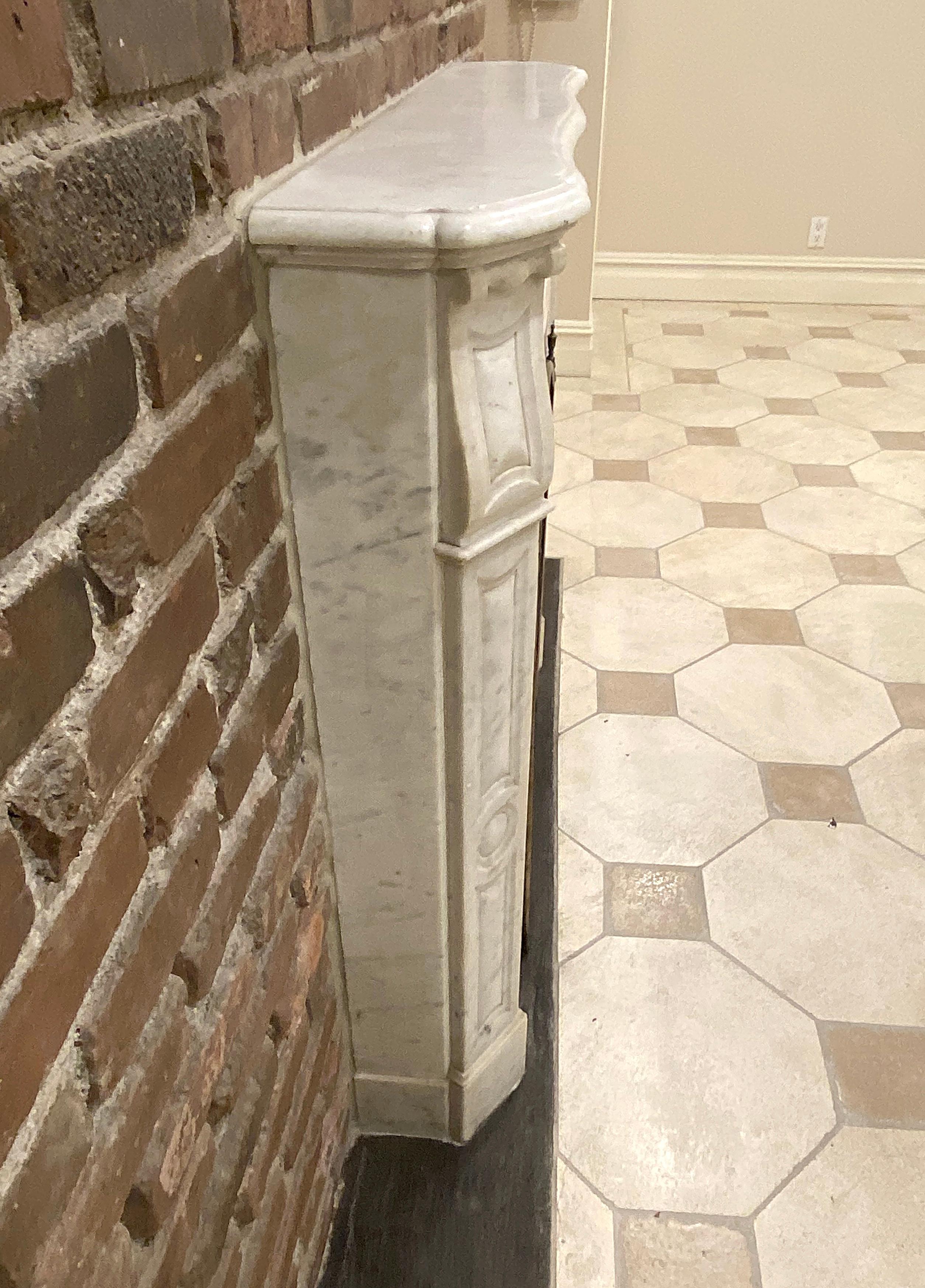 1910s Petite French White Carrara Marble Mantel from West 9th St in Manhattan 3