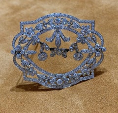 1910s Platinum Diamond Garland Brooch with Floral Motifs