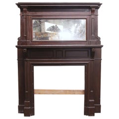 1910s Traditional Carved Wood Two Tier Mantel with Mirror in a Dark Stain