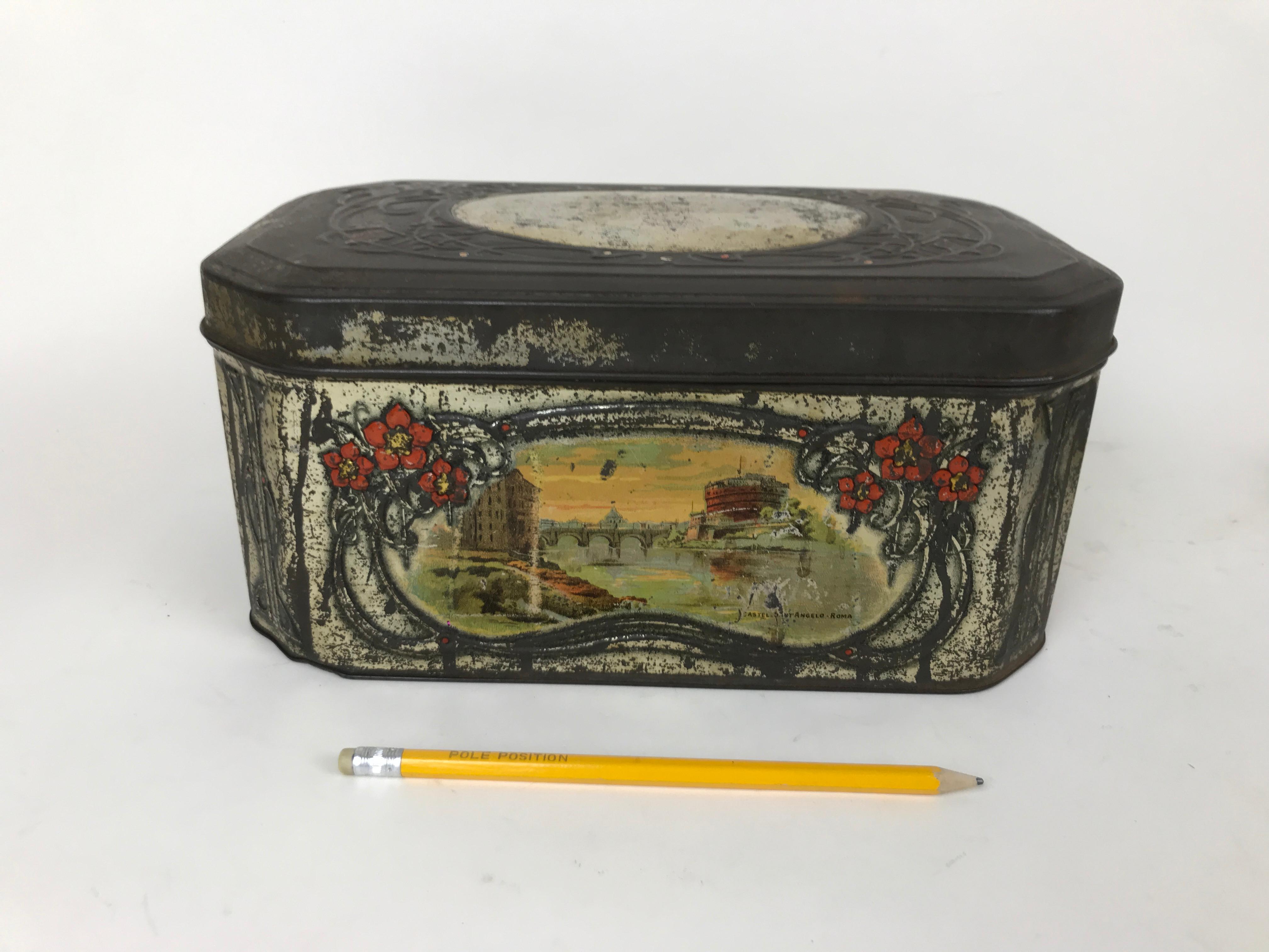 Very nice vintage screen printed tin box produced in Italy in early 1900.

All four sides of the box are decorated with multi Art Nouveau style colored panoramic views of Rome:
-front: the Capitol Square
-back: the Castel Sant'Angelo