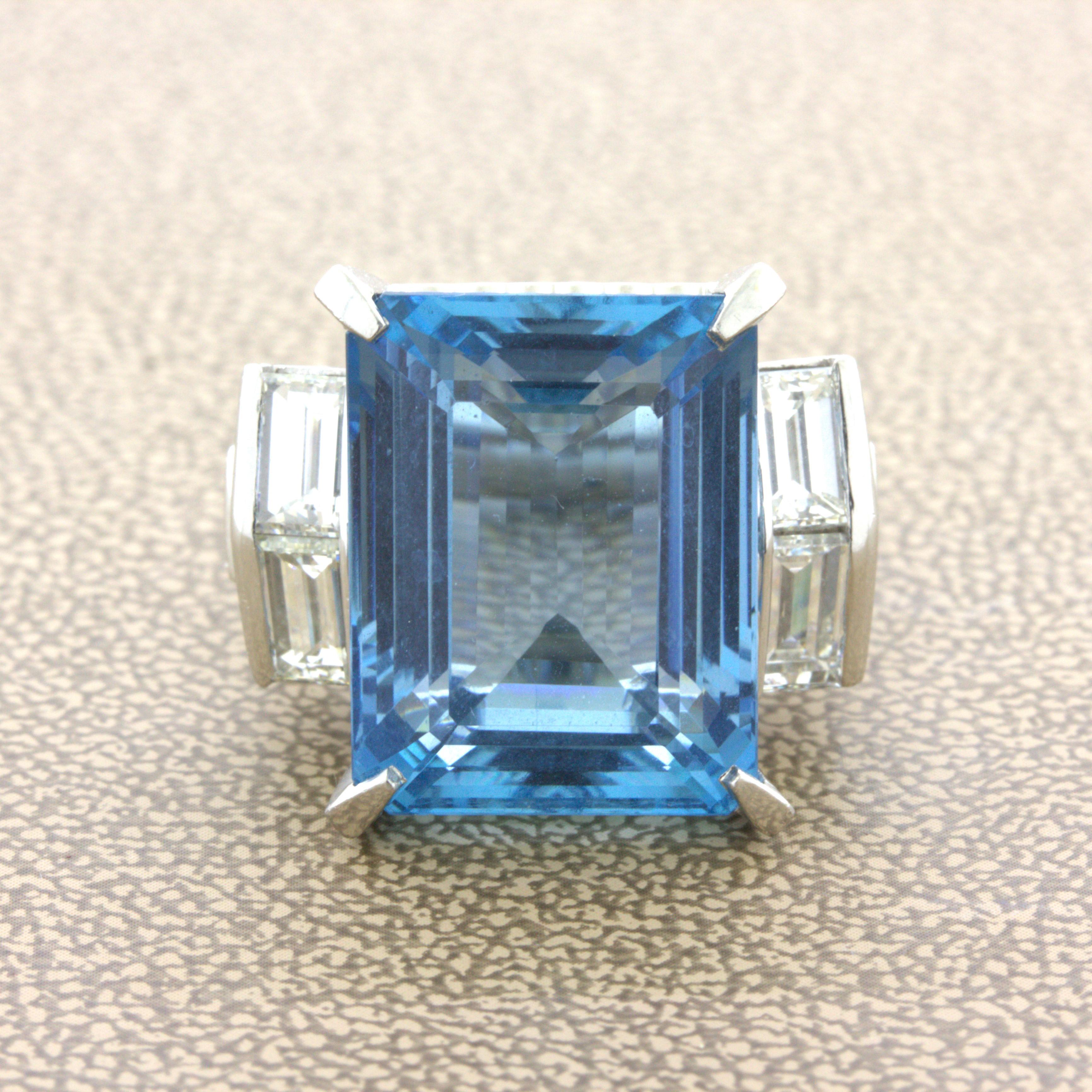 A chic and elegant platinum cocktail ring featuring a very fine quality aquamarine. It weighs an impressive 19.11 carats and has top gem quality sea-blue color, known in the trade as “Santa Maria” type for the finest of colored aquamarine. It is