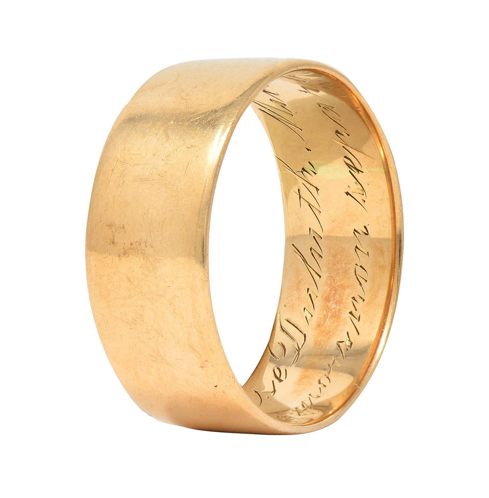 Designed as a wide cigar-style gold band 
Inscribed 'C.Morse Dulith Minn Apr. 11-1911 - Virtus junxit mors mon separabit' 
Translating to 