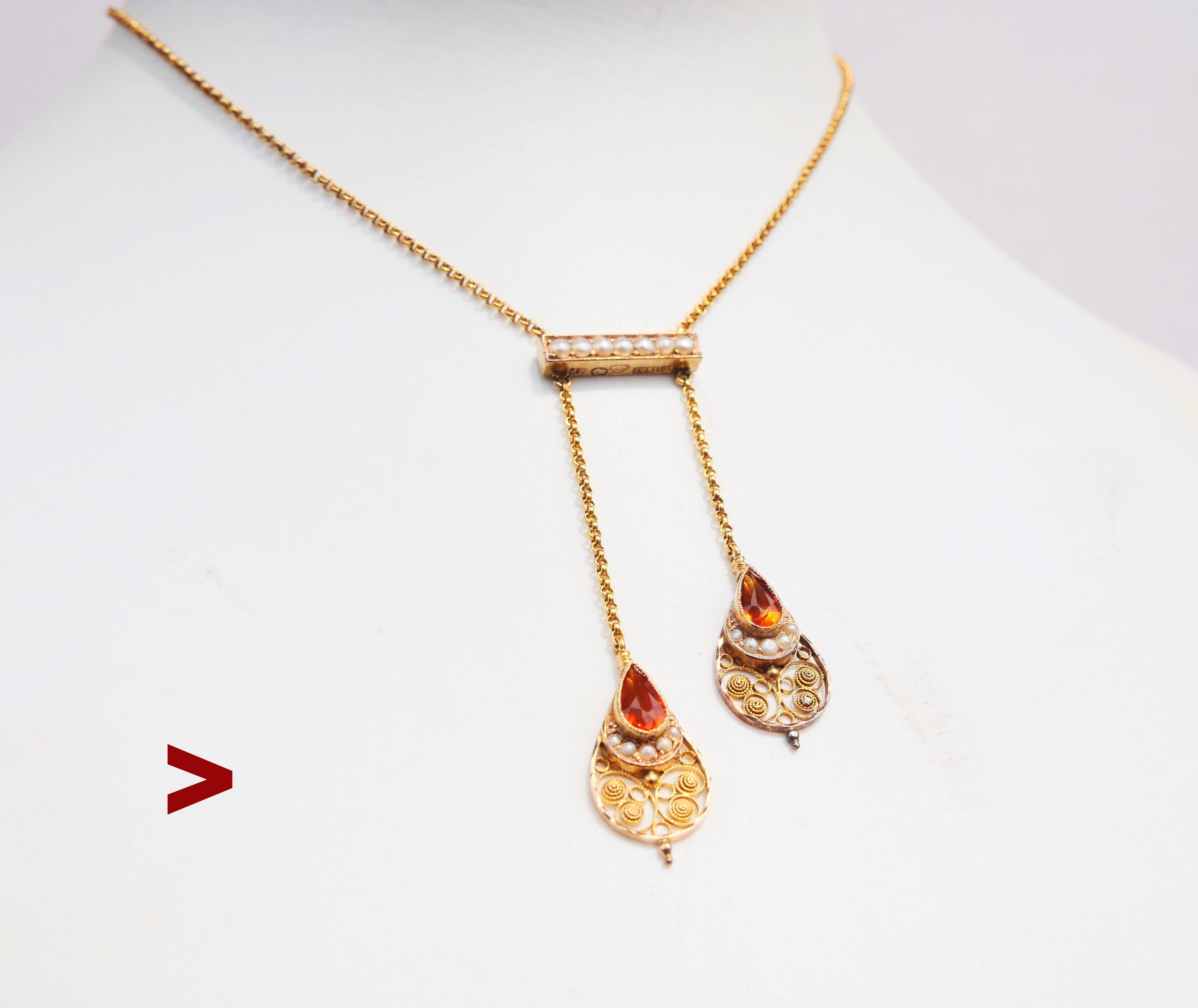Collar Negligee de 18 quilates hecho a mano en Suecia en 1911. Delicado trabajo de filigrana, piedras de citrino natural talladas en forma de pera y perlas de siembra.

Fabricado en Suecia, con matrícula de 18 quilates, el joyero es J.Peterson,