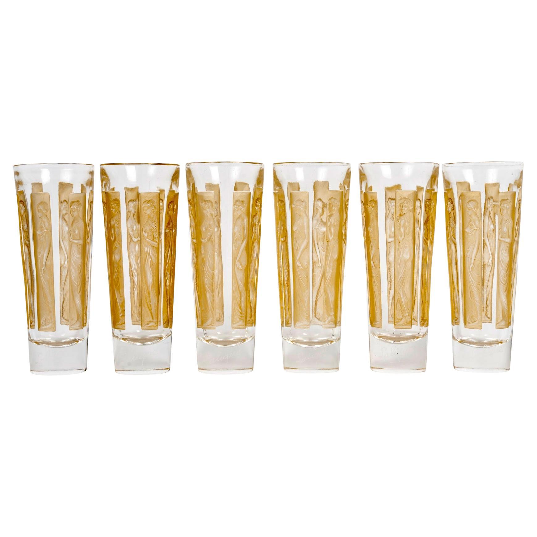 1911 René Lalique Juego de 6 vasos de cristal con seis figuras Pátina sepia en venta