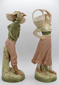 1912-1918 Coppia di statuine in porcellana "Royal Dux Bohemia"