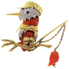 19.12 Carat Carved Coral and Diamond Fishing Bird Brooch 14 Karat Yellow Gold