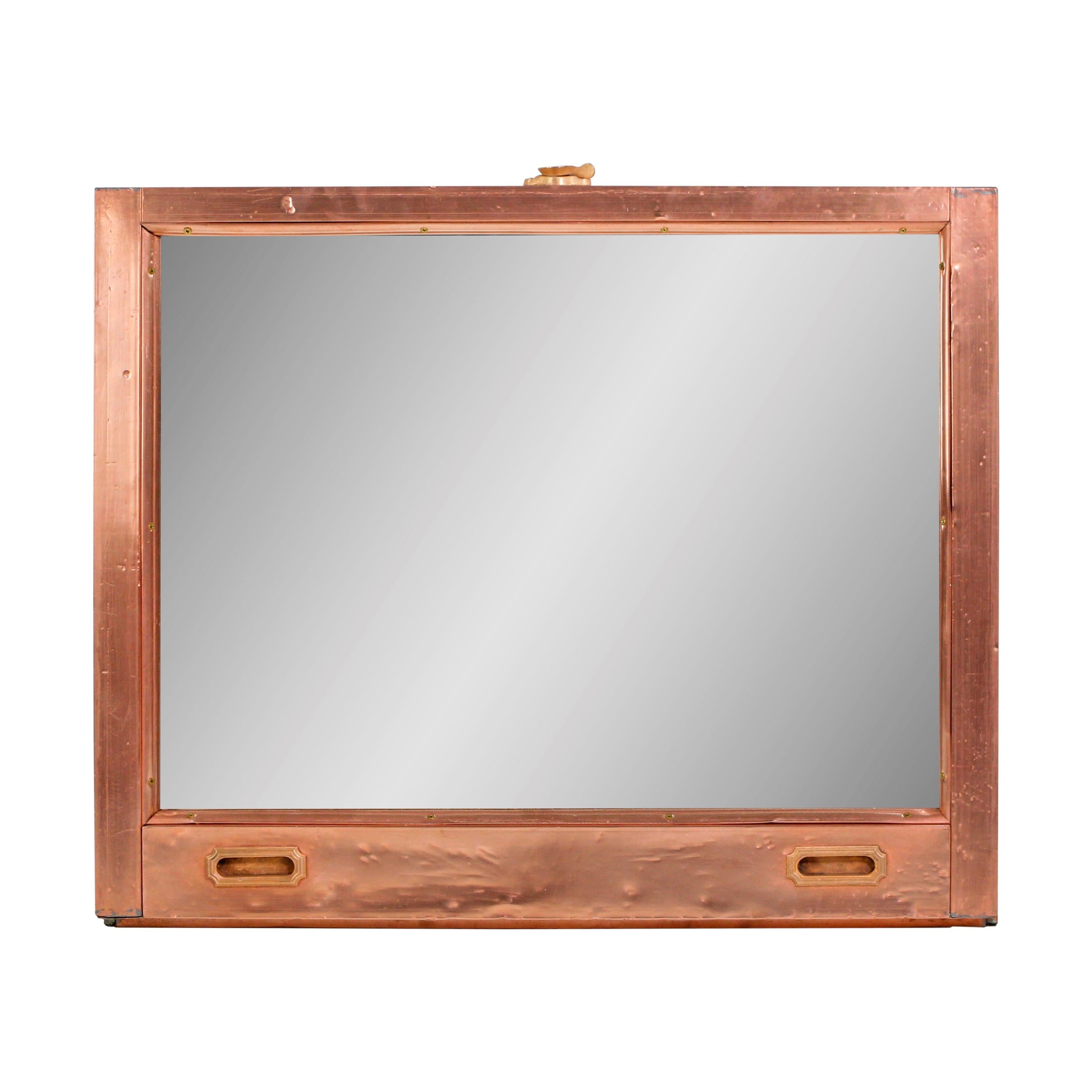 An actual 1912 copper clad wood window from the Hotel McAlpin at Broadway and East 34th St in Manhattan, NYC. Cleaned and polished with new mirror installed. Mounting cable on back. Please note, this item is located in our Scranton, PA location.