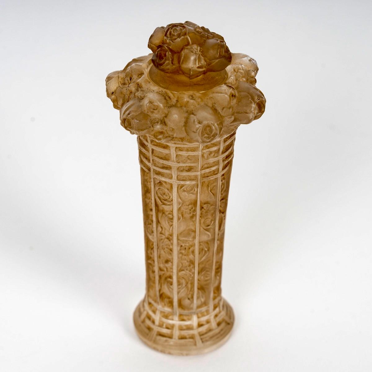 Perfume Bottle “Panier de Roses” made in frosted glass with sepia patina by René Lalique in 1912.
Engraved signature.

Perfect condition. Very beautiful patina. Rare model.

height: 9.5 cm

Félix Marcilhac, René Lalique - Catalogue Raisonné de