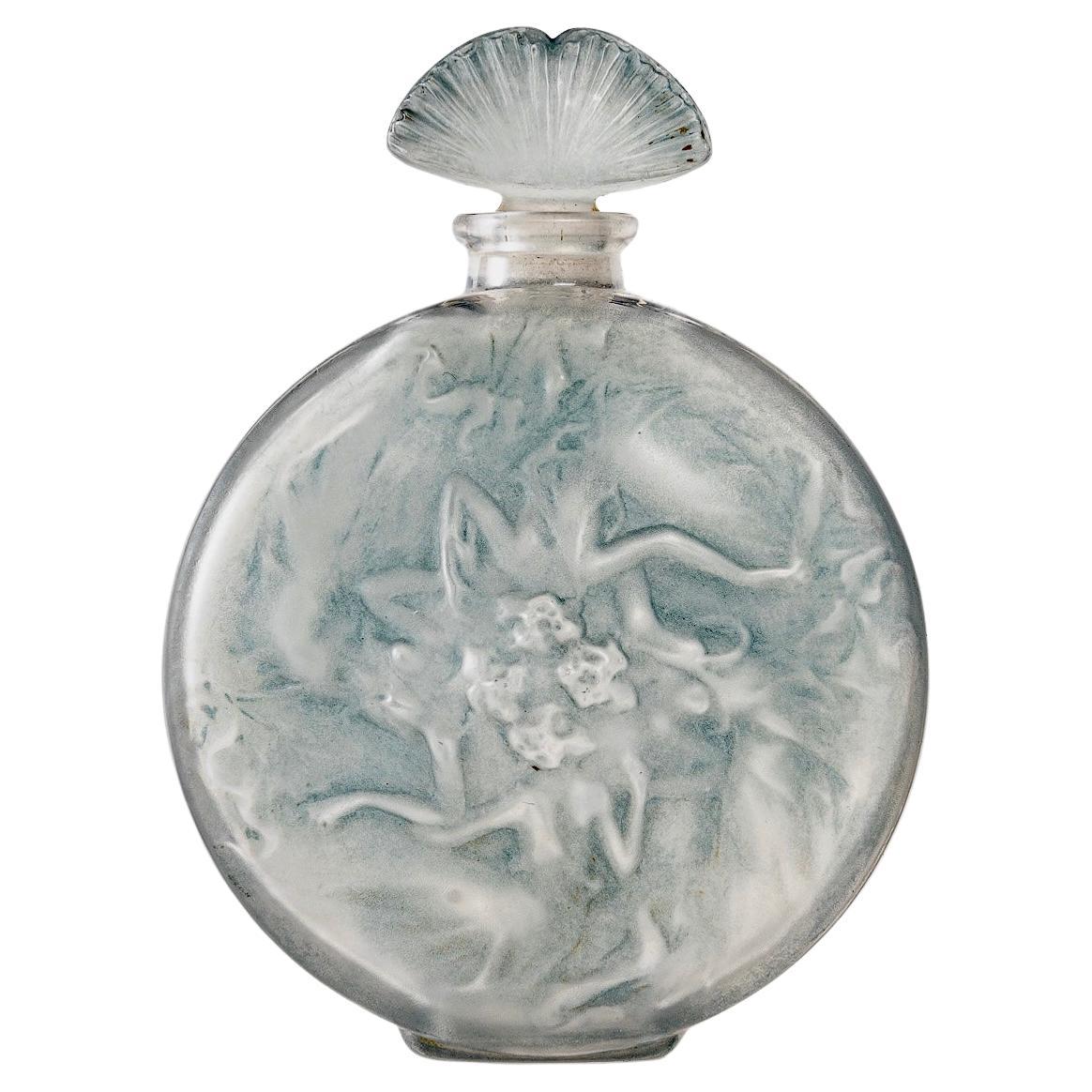 1912 René Lalique Perfume Bottle Rosace Figurines Frosted Glass Blue Patina For Sale