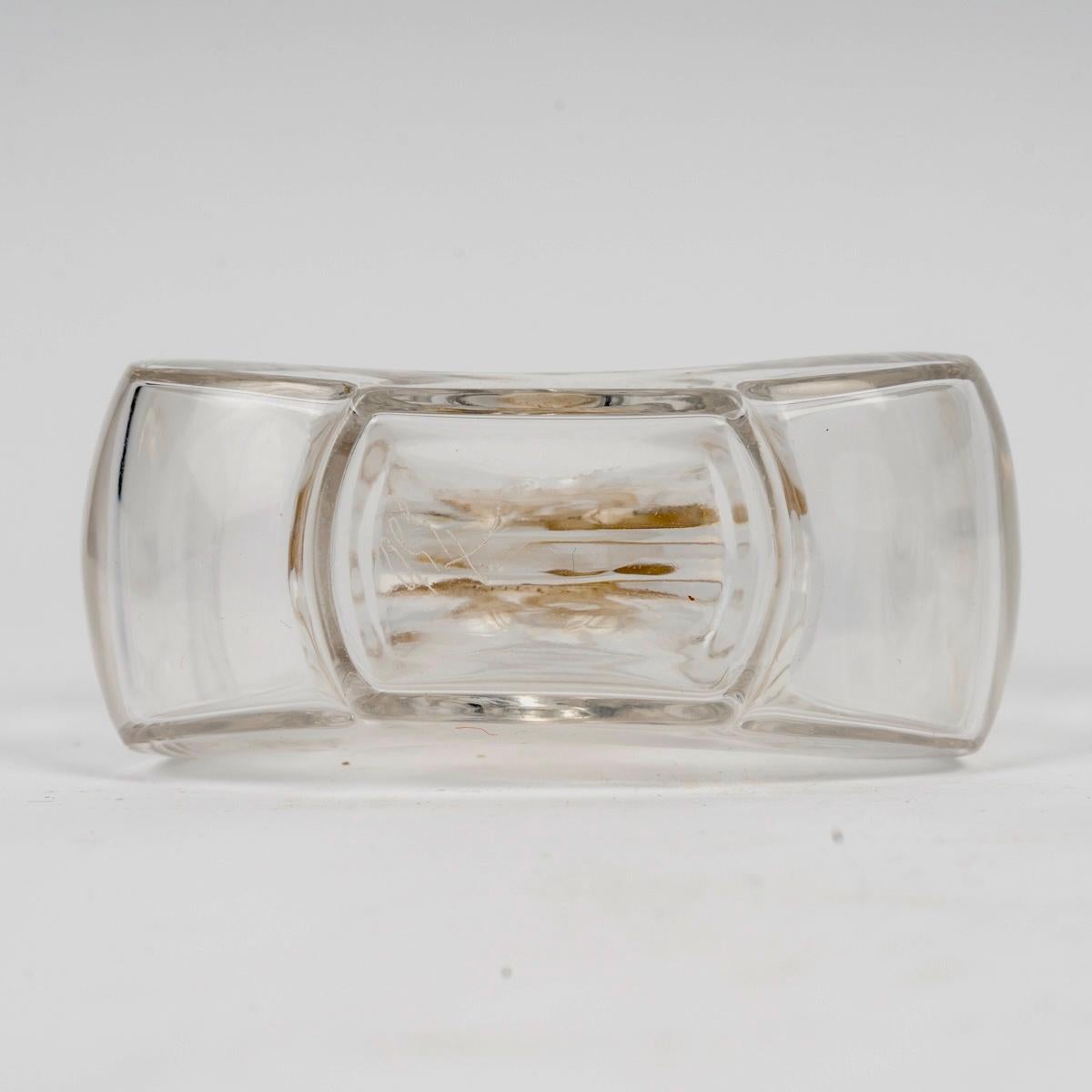 Stampato 1912 Rene Lalique Bottiglia di profumo Sirenes in vetro con patina seppia per Burmann in vendita