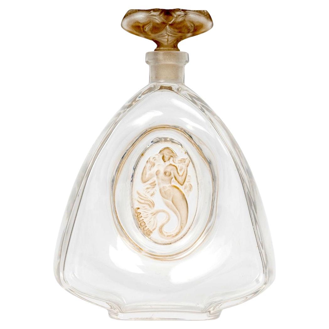 1912 Rene Lalique Bottiglia di profumo Sirenes in vetro con patina seppia per Burmann in vendita