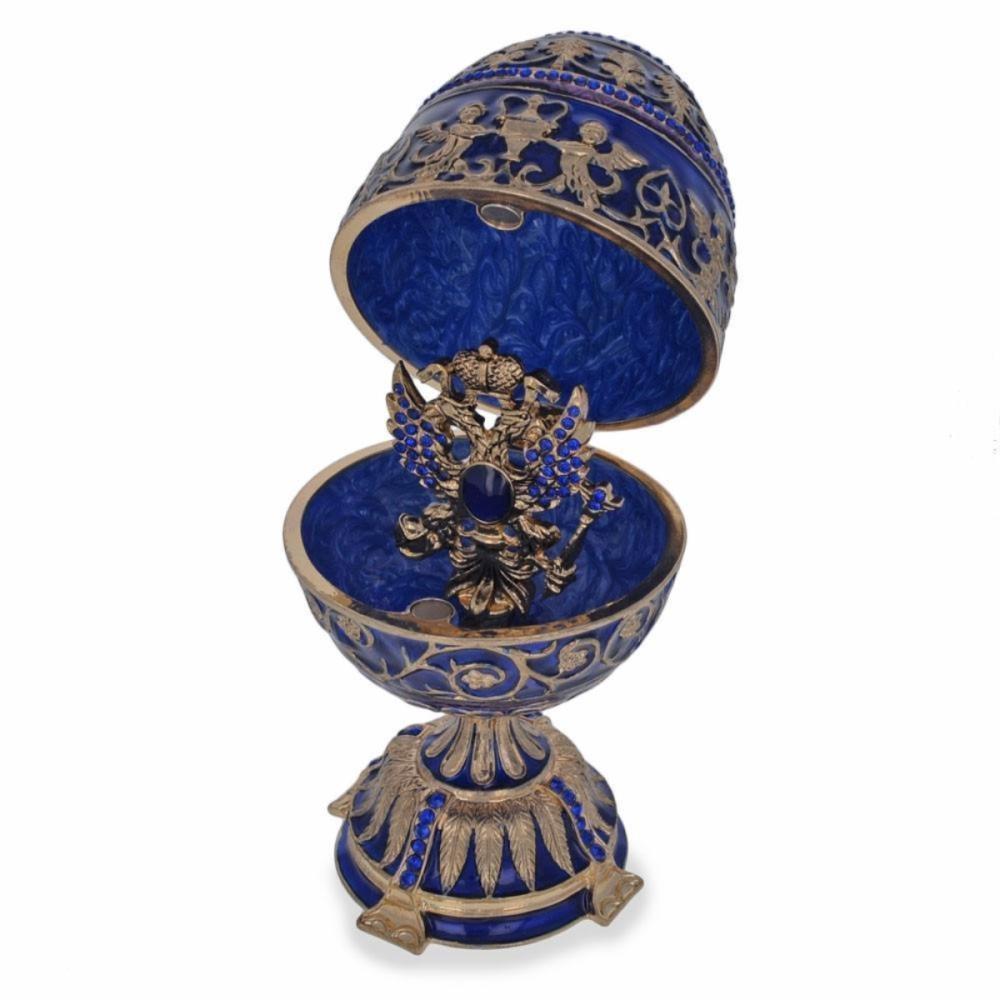 1912 Tsarevich Faberge egg 5.5 inches tall enamel gold plated pewter, Austrian Crystals hand-painted padded satin lined gift box imported this sparkling egg is adorned with clear crystals and high-polished enamel with golden trim. It opens on a
