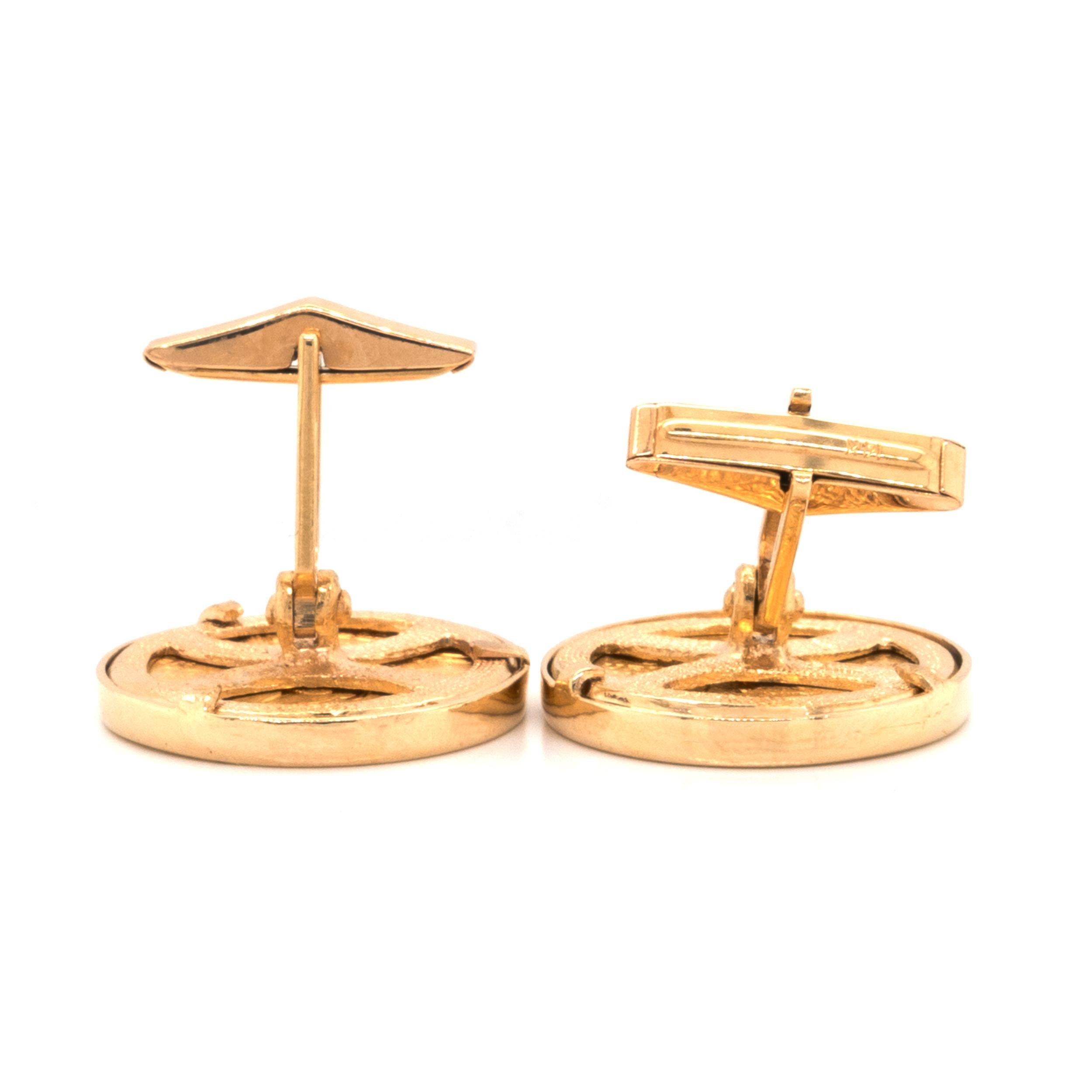 Material: .900 pure / 14K yellow gold
Dimensions: cufflinks measure 23mm 
Weight: 28.26 grams
