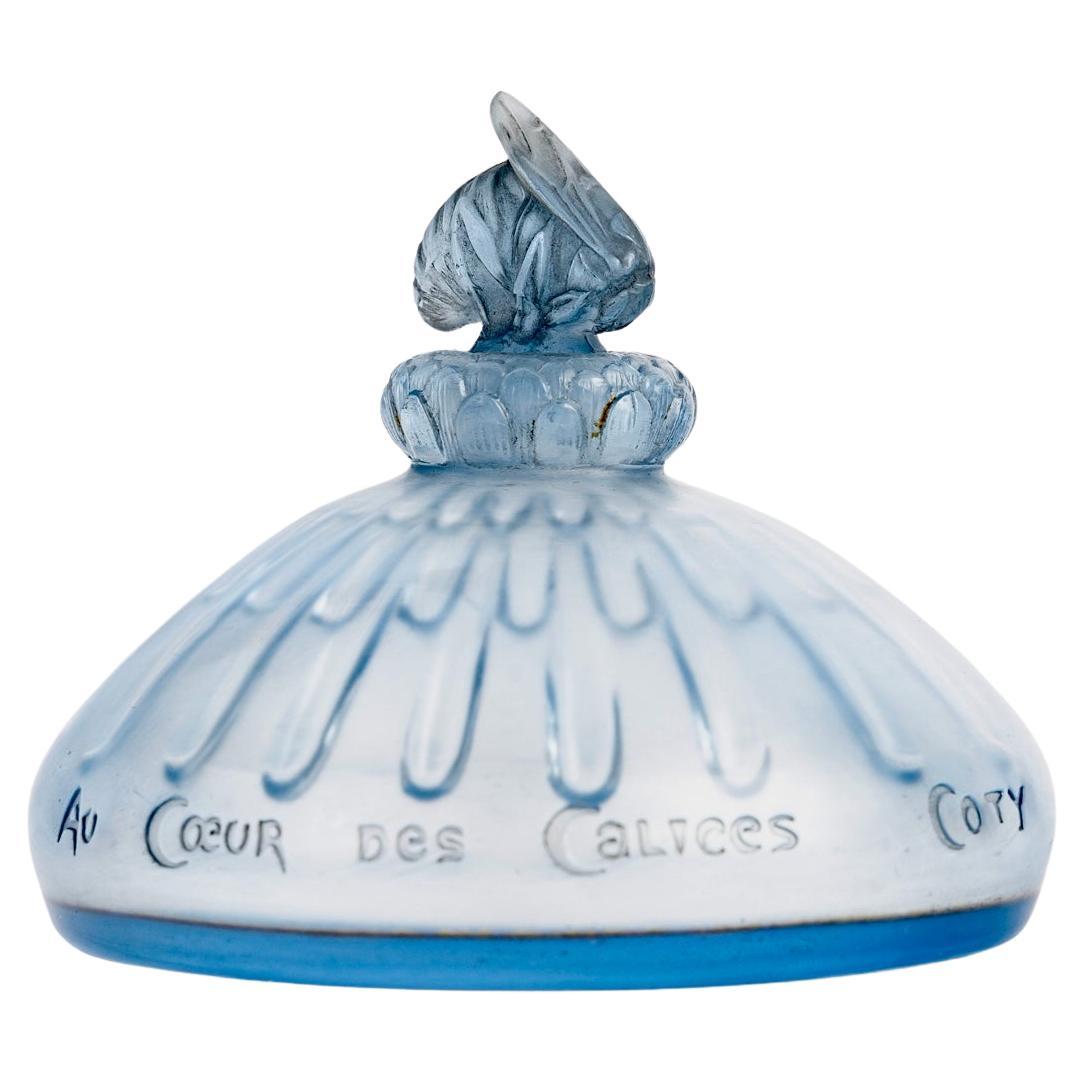 1913 René Lalique Bottiglia di profumo Au Coeur Des Calices in vetro azzurro per Coty