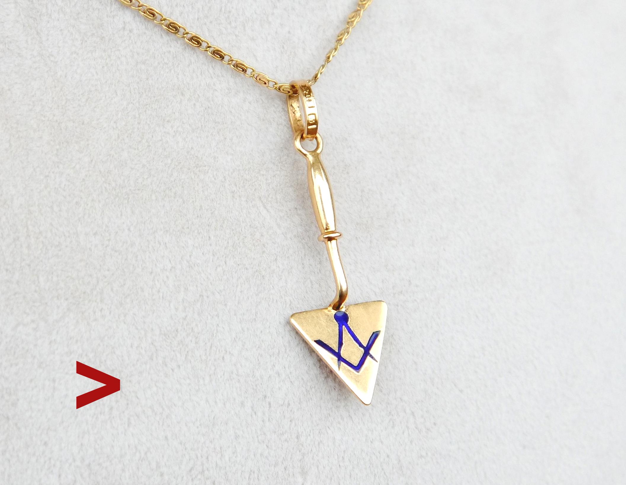 Antique Freemason Masonic Trowel pendant in solid 18K Yellow Gold featuring miniature Freemason trowel with Enameled masonic symbols on front side and engraved brick pattern on the back side of the trowel's blade. In finest used condition.

Swedish,