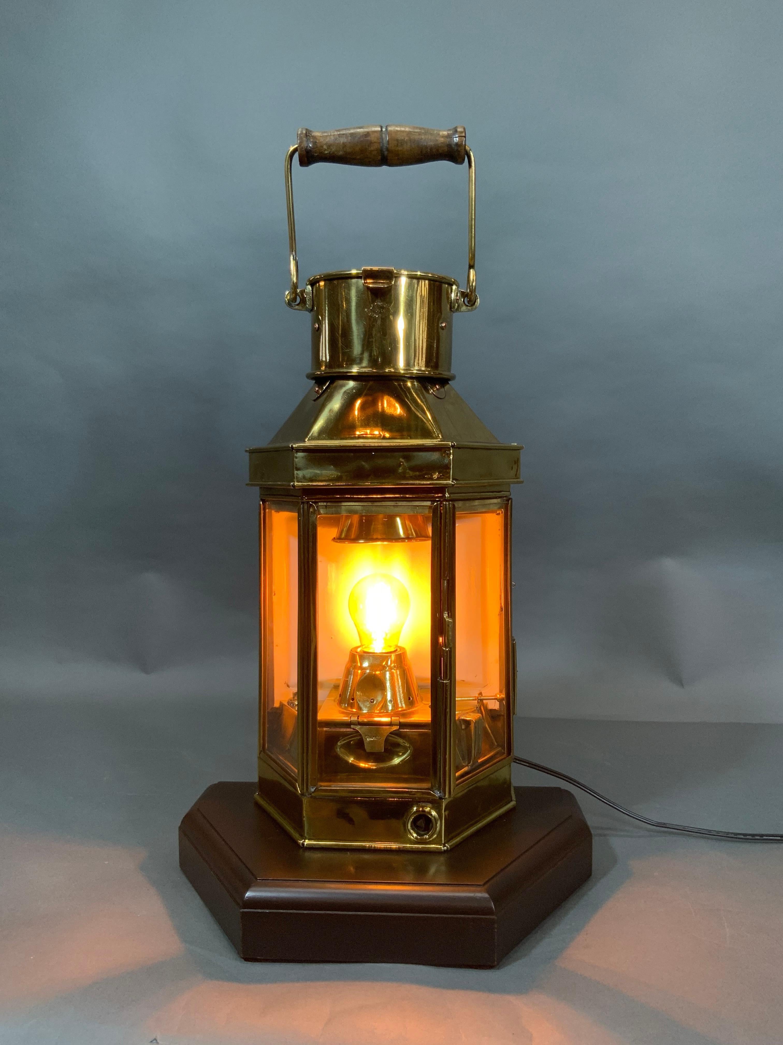 Solid brass cabin lantern by Bulpitt of Birmingham England dated 1914 with engraving. This lantern is quite similar to what was on the Titanic and the great White Star Liner of the day in the cabins. This is a relic of the past. With three glass