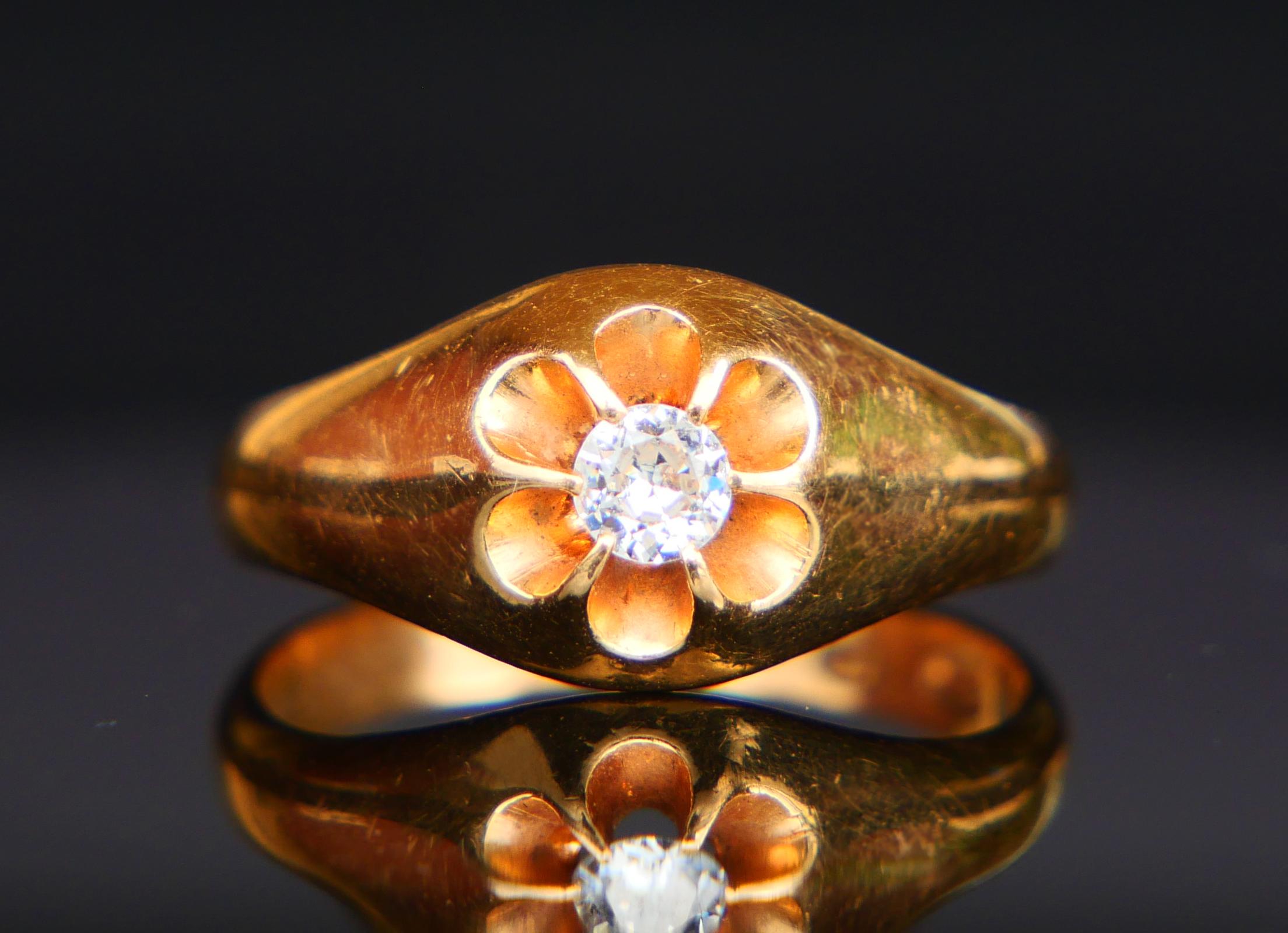 A Ring with wide shoulders and flower crown featuring a claw set natural old *European diamond cut Diamond Ø3.75mm / ca. 0.25 ct. color ca.F,G/VS
Crown is 9mm at its widest x 3.5 mm deep.

Finish hallmarks: Crown , 750, maker's marks not clear,