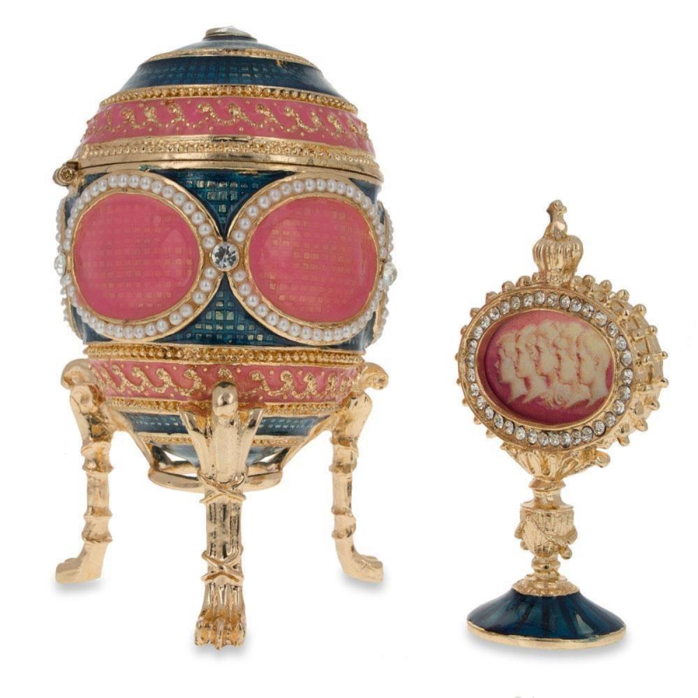 1914 Mosaic Faberge egg 3.8 inches tall (with the stand) x 2.1 inches diameter 9.6 cm tall x 5.3 cm diameter picture frame is 2.6 inches tall x 1.5 inches wide (6.6 cm x 3.8) Pewter, enamel handcrafted gift boxed this hand-painted egg is adorned