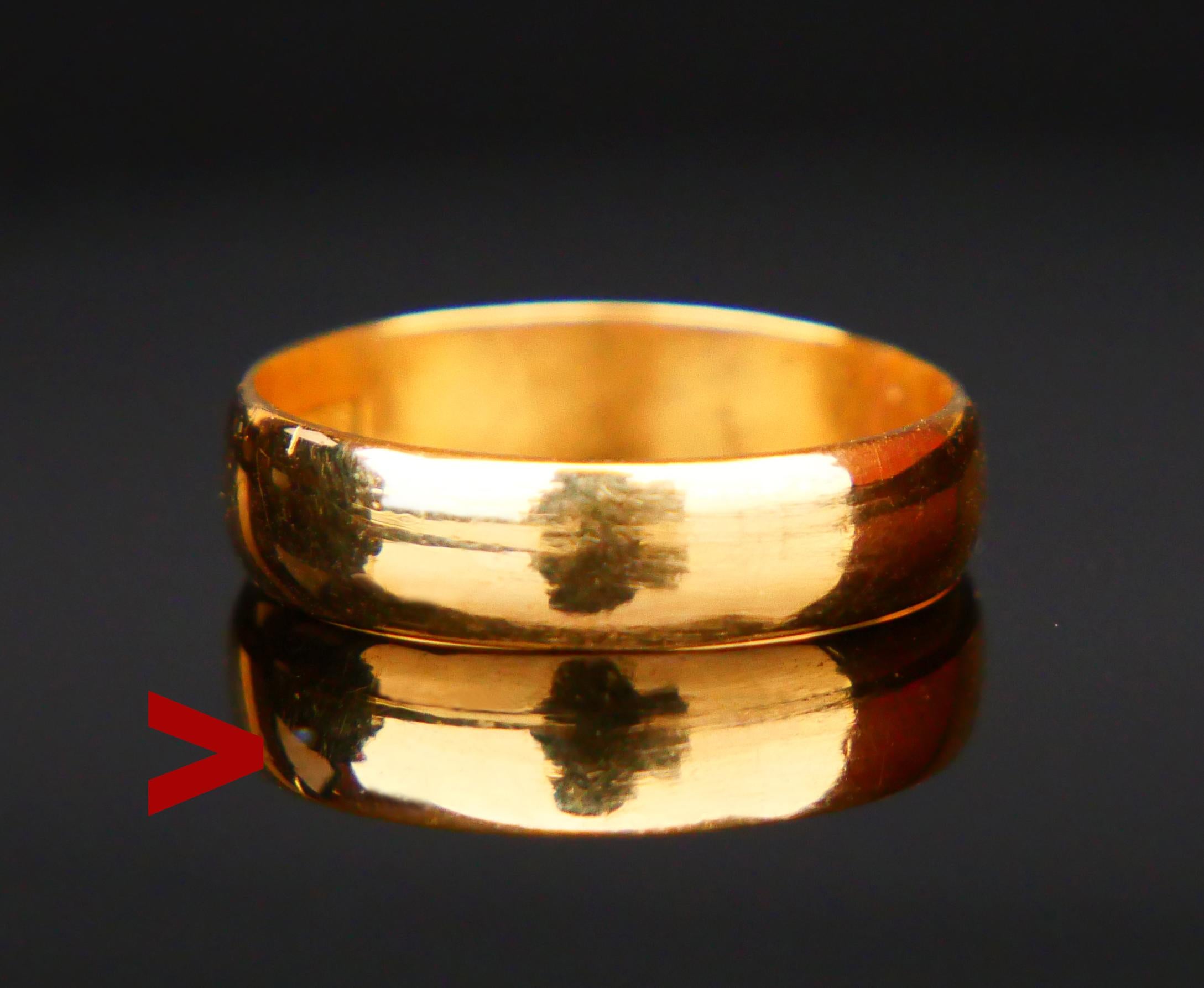 23K Wedding Ring with a bit convex shaped well polished band.

Made in Sweden. Unknown workshop, city of Goteborg , hallmarked 23K.

Year mark: M7 / made in 1914. Engraved with monogram J.O

The band is 4 mm wide. Size : Ø 4.5 US / 15.27 mm. Weight:
