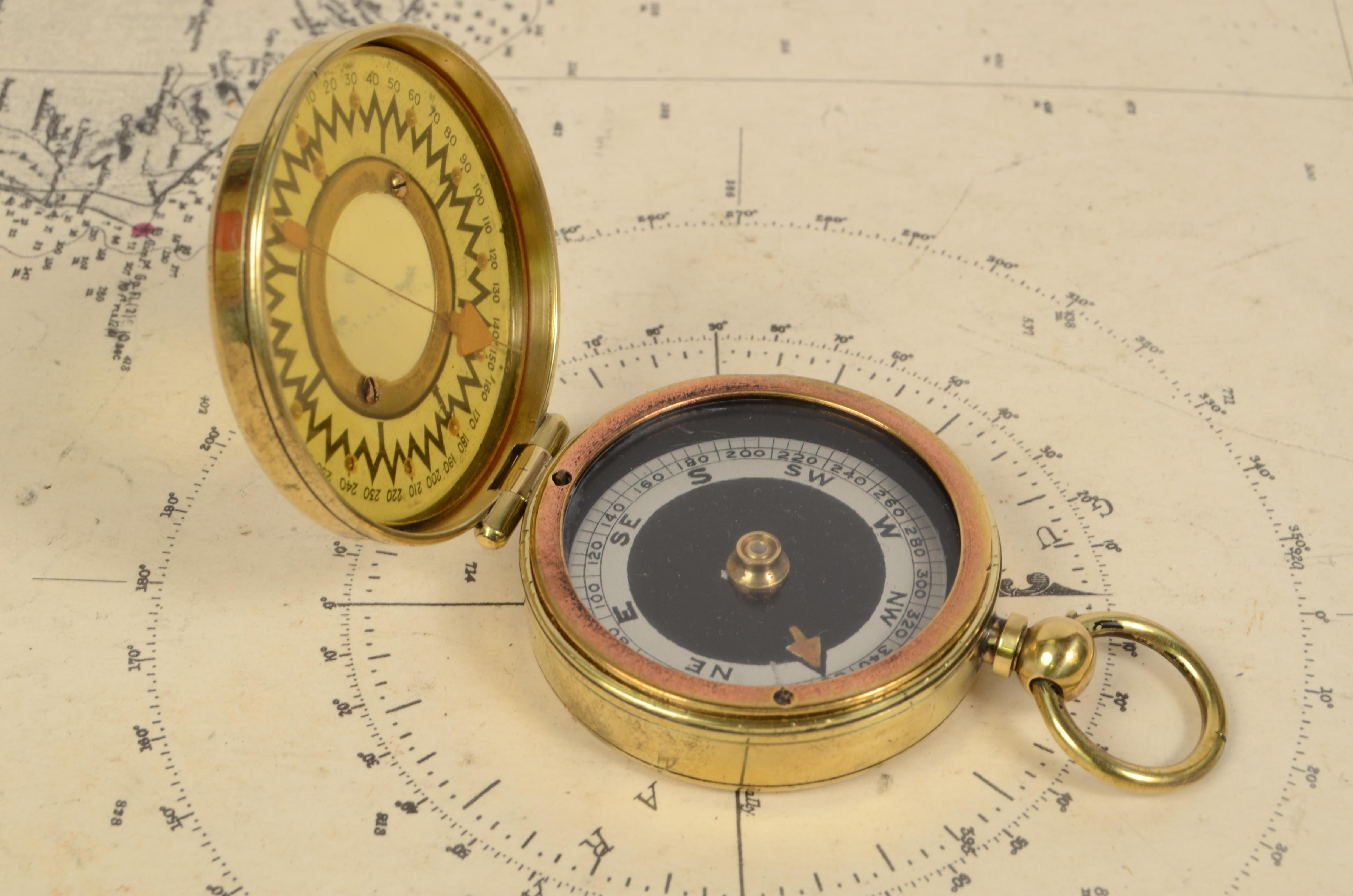 Brass survey compass made in 1914 circa, signed The Magnapole;
and realized by Negretty & Zambra small compass used away from magnetic fields to check the ship’s course. The compass is complete with a goniometric circle and a block of compass card.