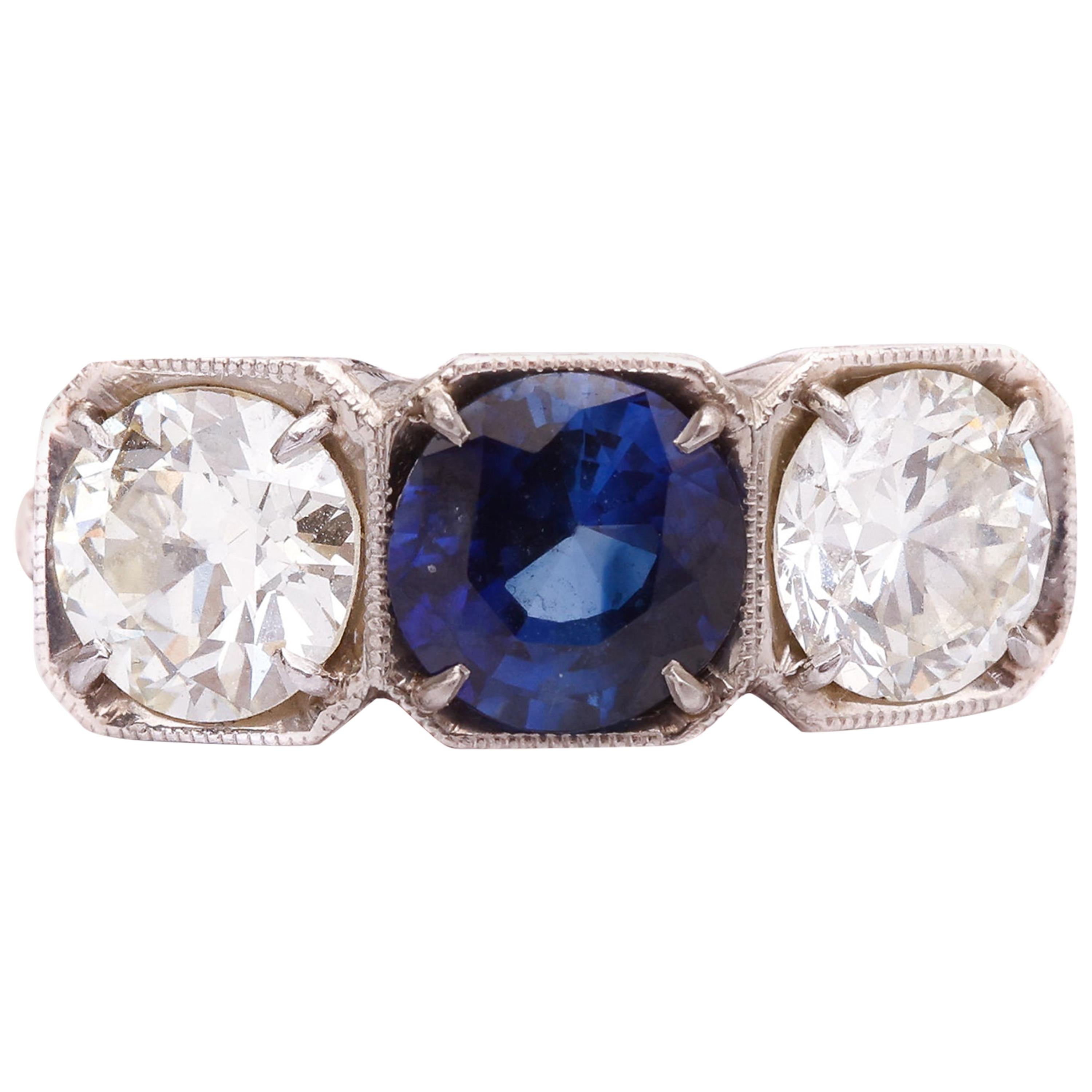 1915 1.14 Carat Sapphire and 2 Carat Total Diamond Platinum Ring For Sale