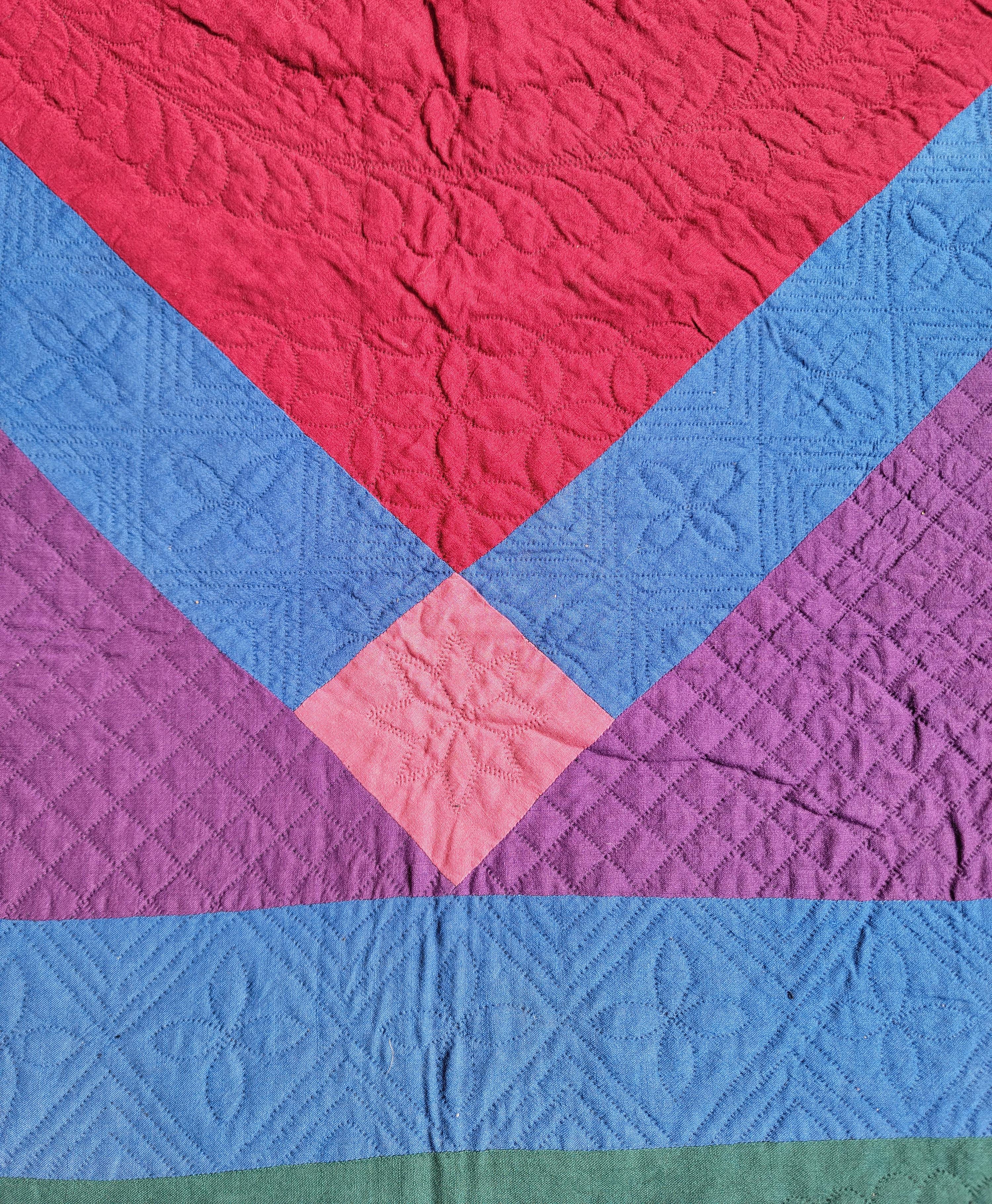 This Amish all wool diamond in a square quilt quilt from Pennsylvania is in fine condition. This fine quilted Pennsylvania Amish quilt is so fantastic with the center red diamond has stars quilting.A similar Amish diamond is documented in 