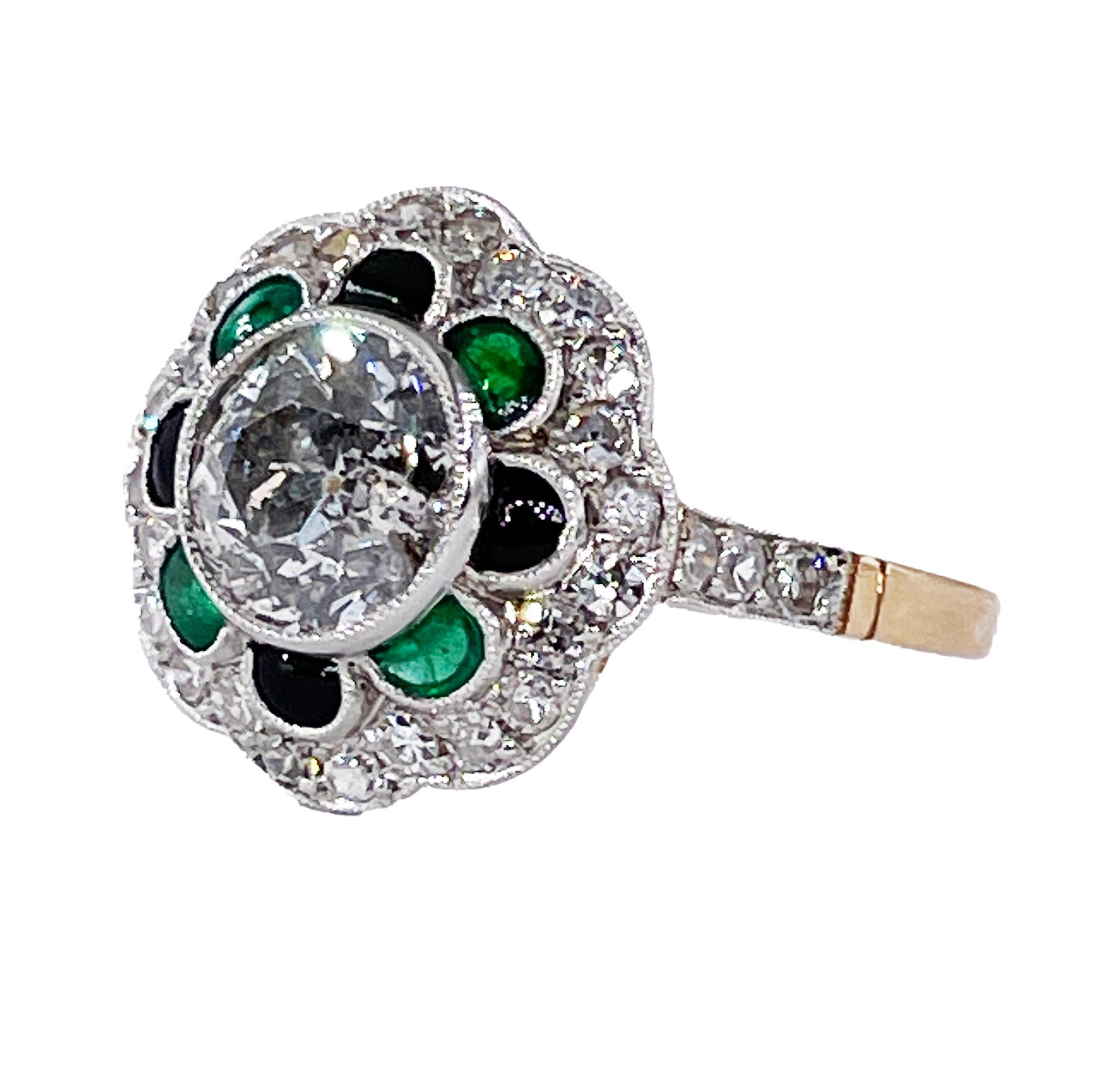 Antique 2.27ctw OLD EUROPEAN Diamond Emerald Black Onyx Cocktail Flower Cluster Platinum 18K Gold Ring, Circa 1915.

This breathtakingly beautiful, darling and delicate Flower shaped, Cluster Ring finely hand crafted in Platinum & 18K Yellow Gold (