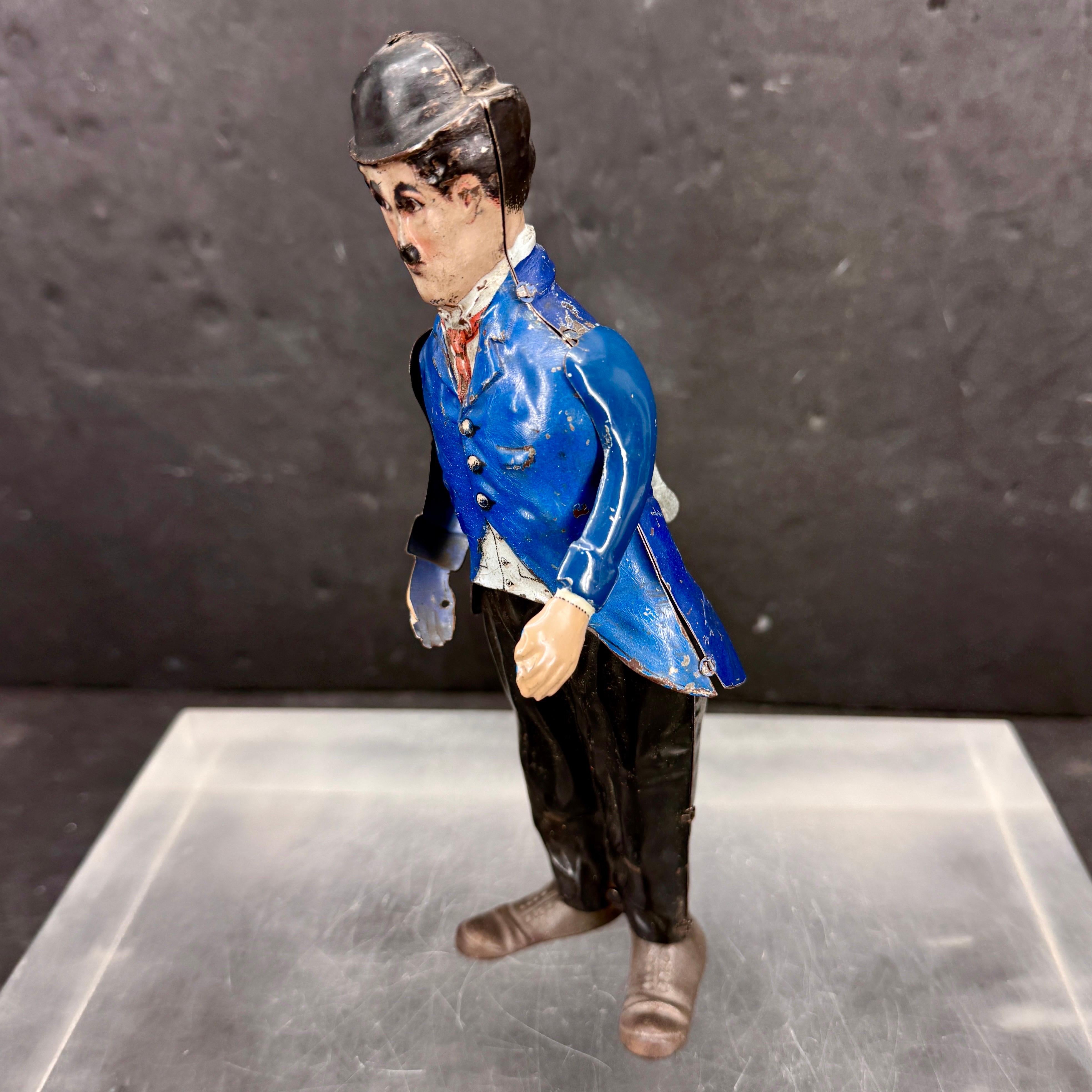 1915 I. A. B. Charlie Chaplin Litho en fer-blanc Figurine à remonter Jouet en vente 2
